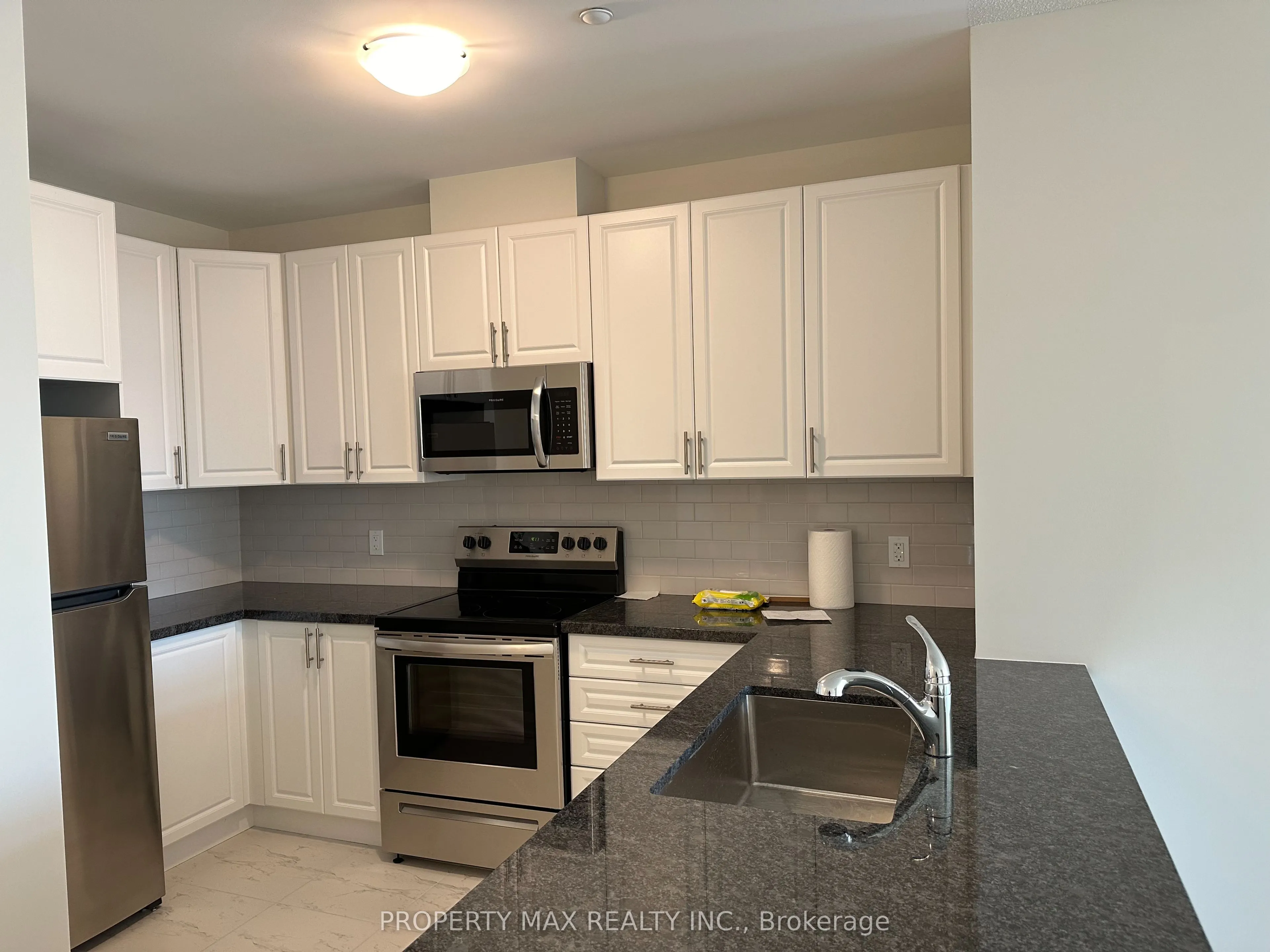 5917 Main Street, #303