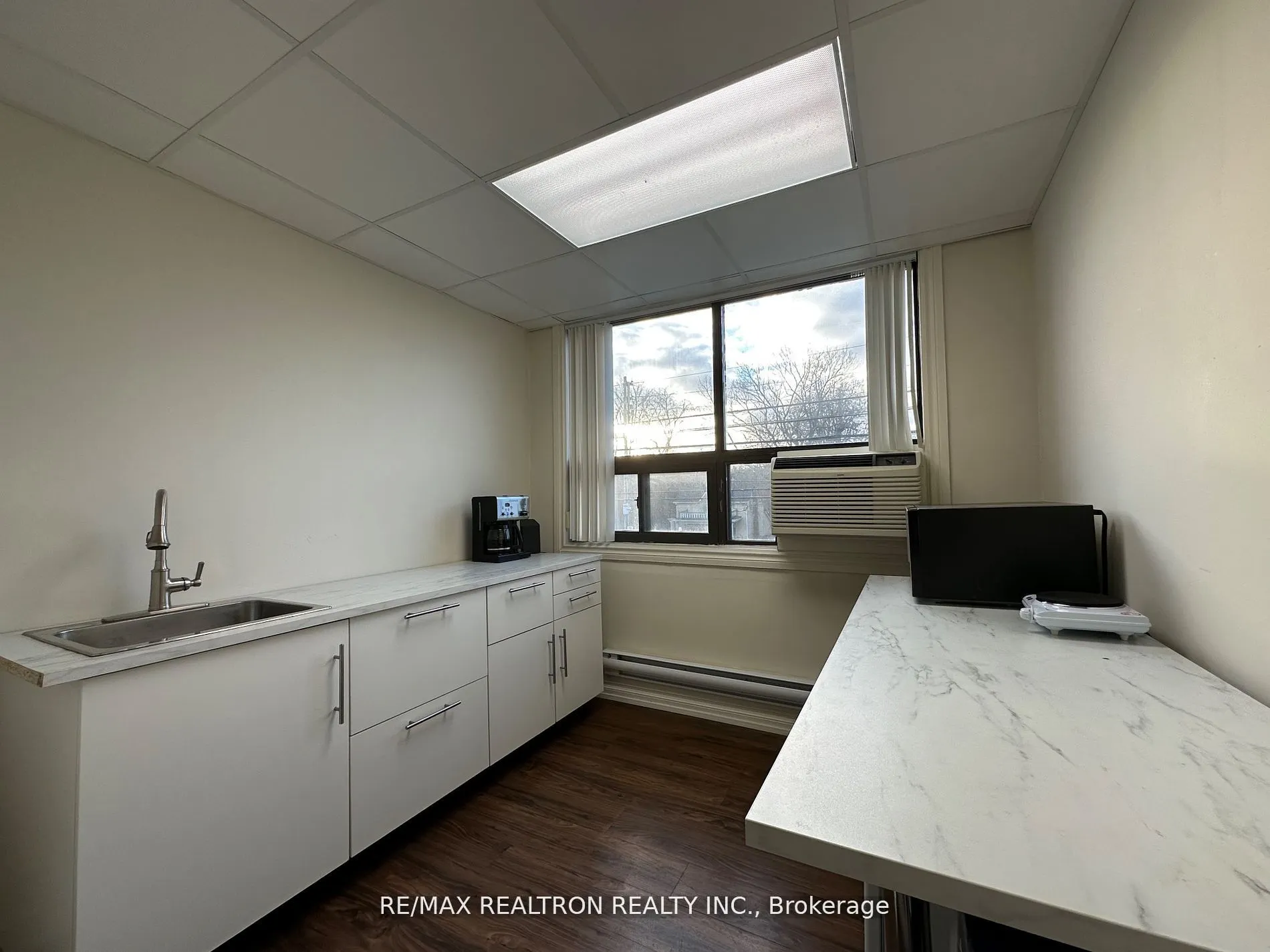 7711 Yonge Street, #201D