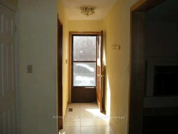 7463 Sigsbee Drive, #Side unit