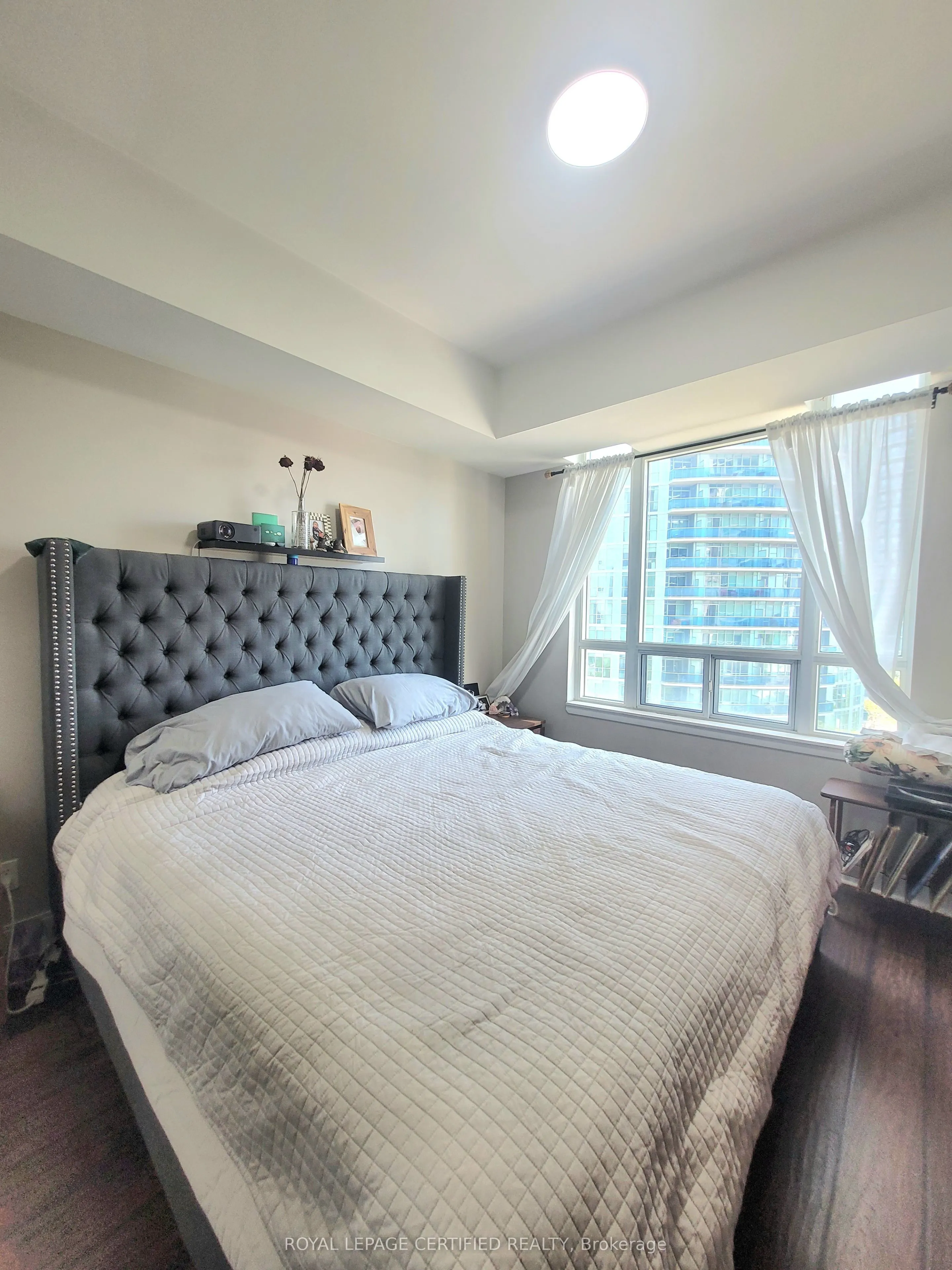 90 Absolute Avenue, #909