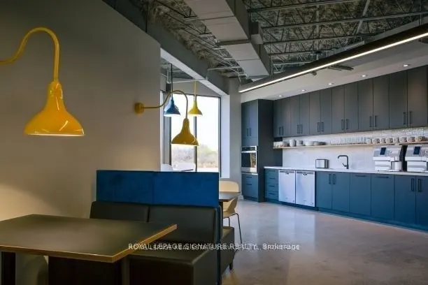 2115 South Service Road W, #100