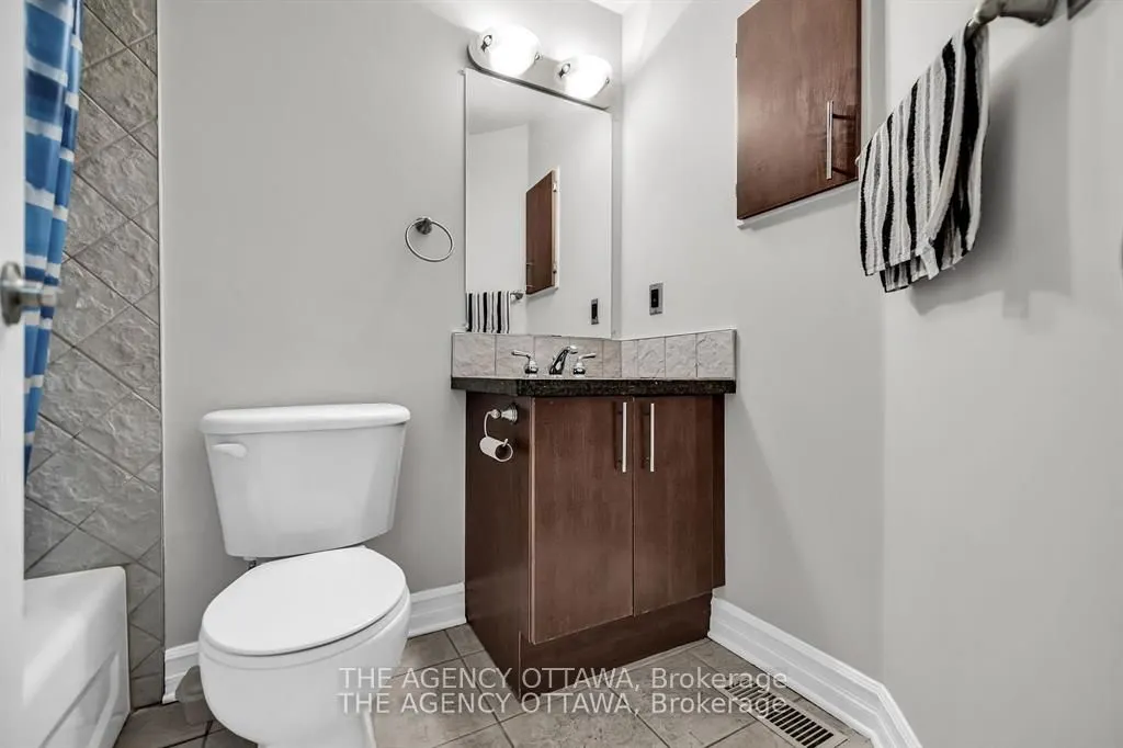 711 CHURCHILL Avenue N #203