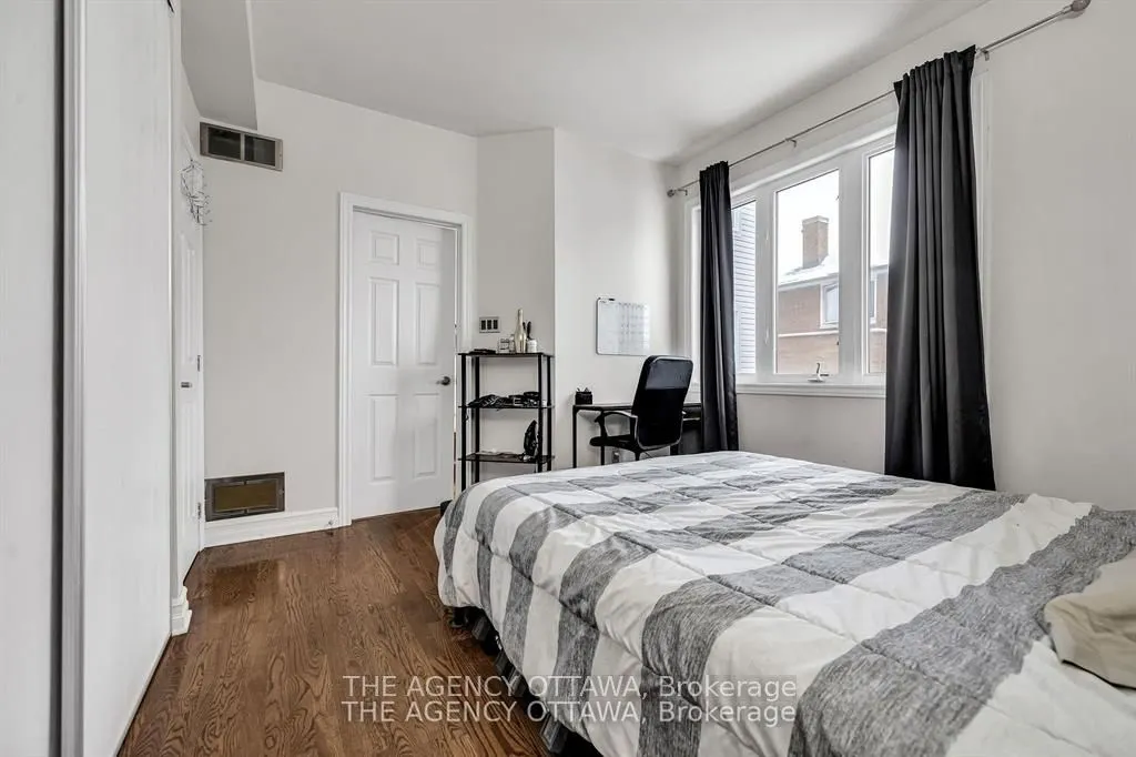 711 CHURCHILL Avenue N #203