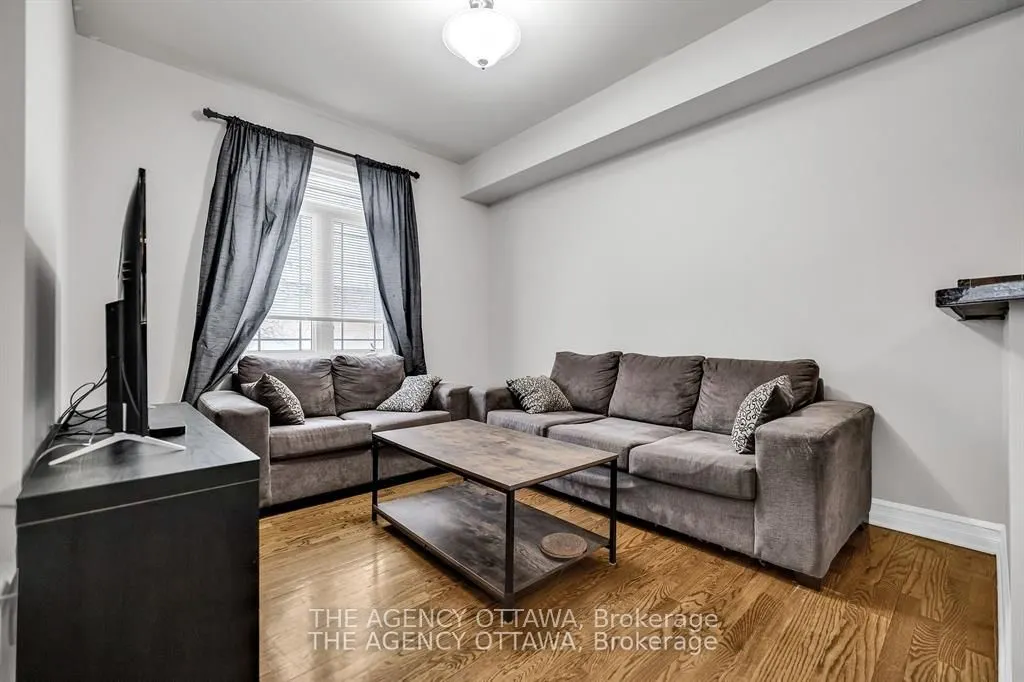 711 CHURCHILL Avenue N #203