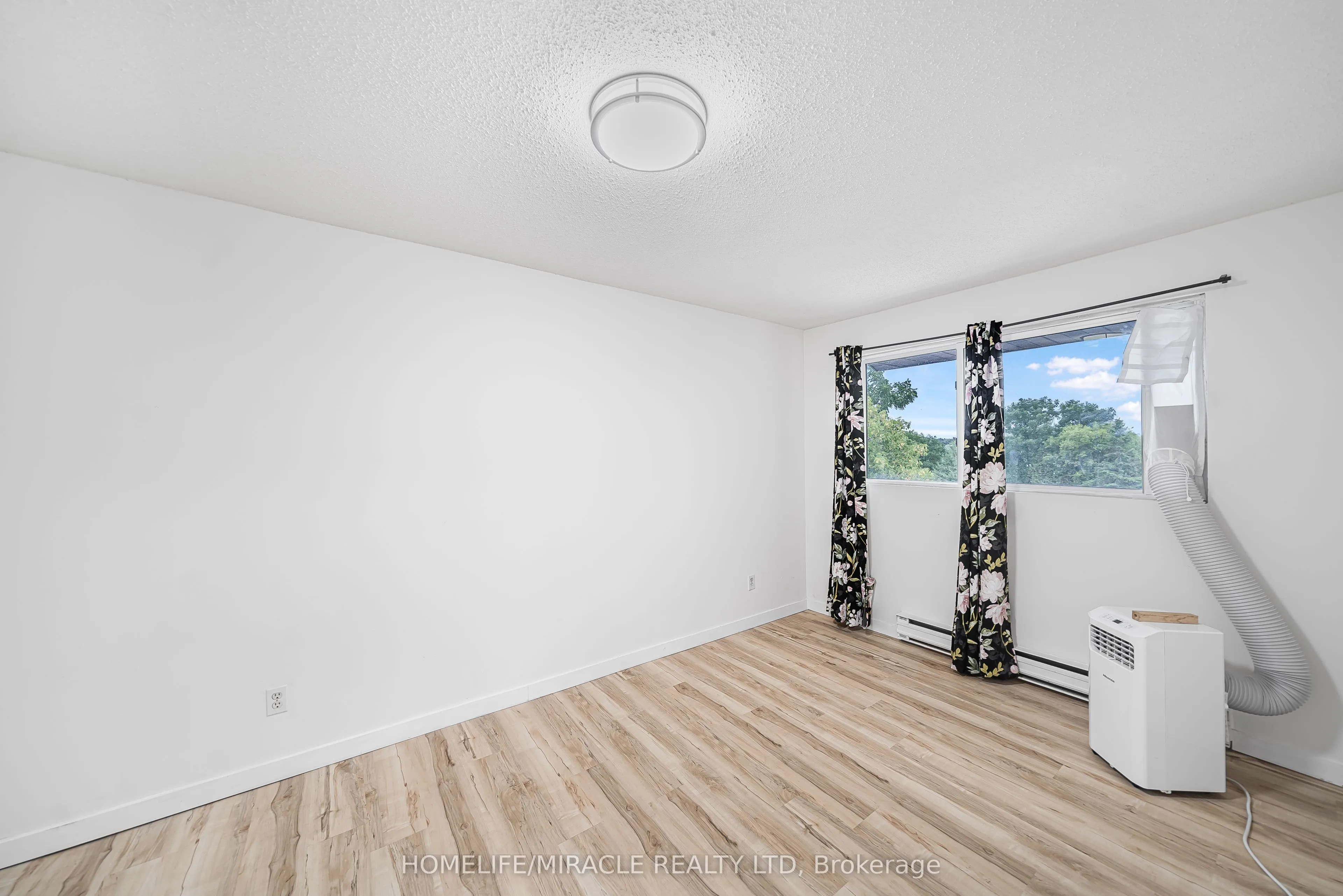323 Main Street W, #305