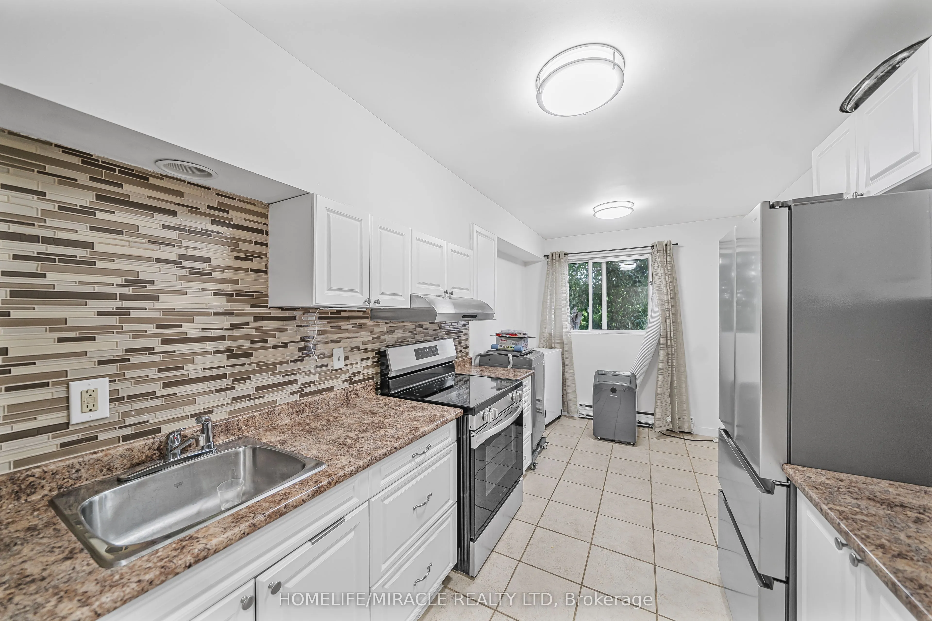 323 Main Street W, #305