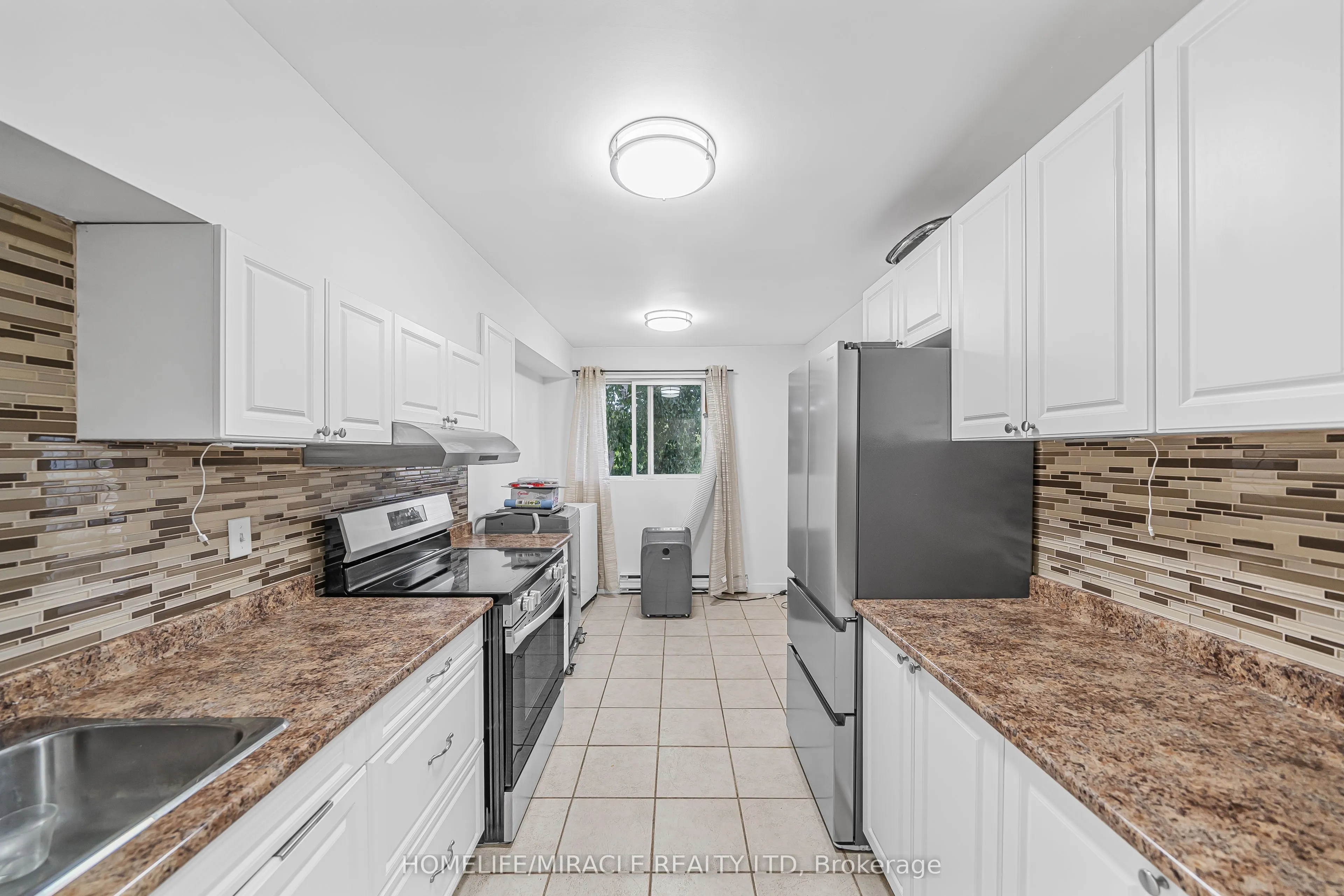 323 Main Street W, #305