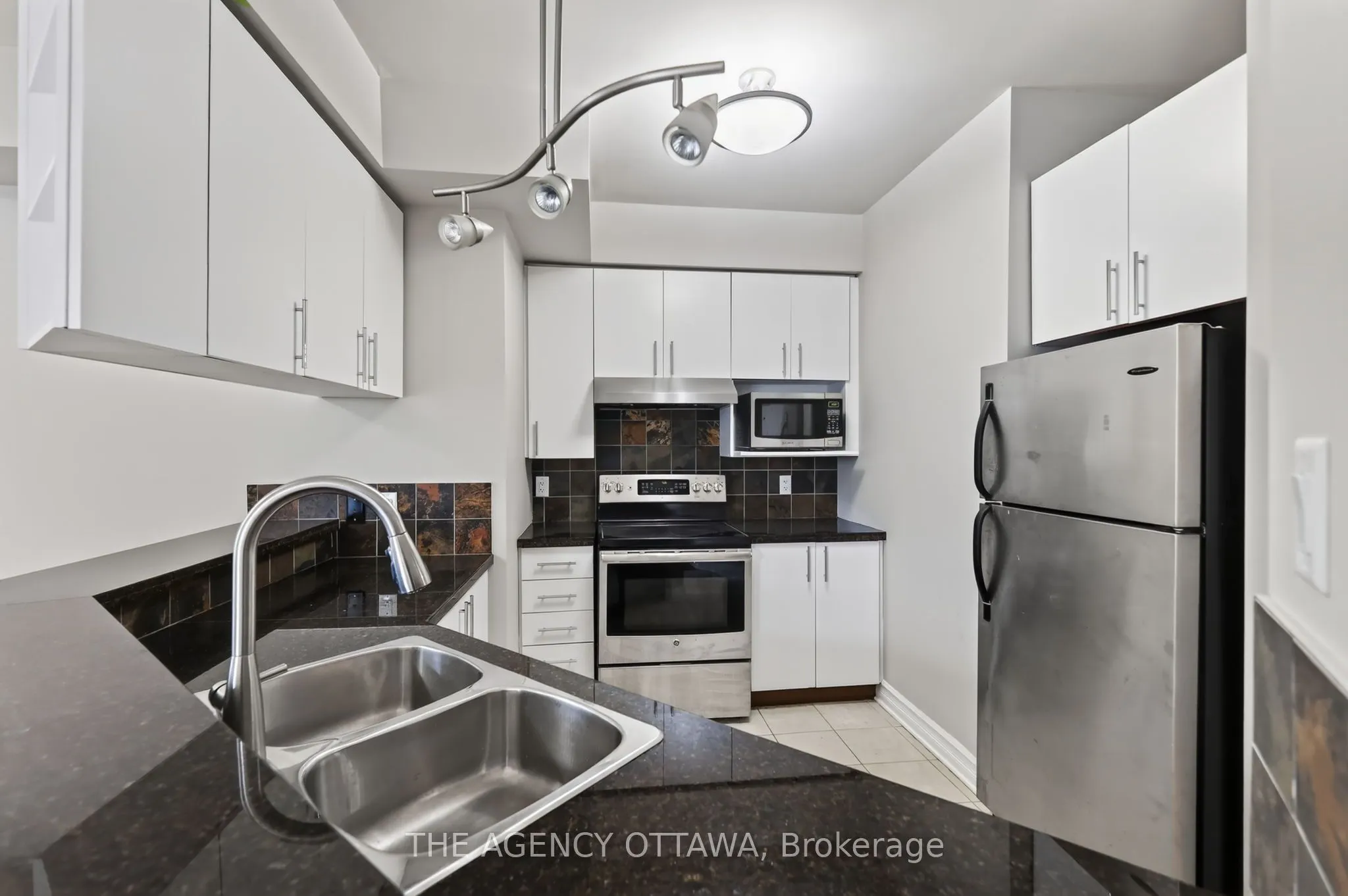 711 Churchill Avenue N #203