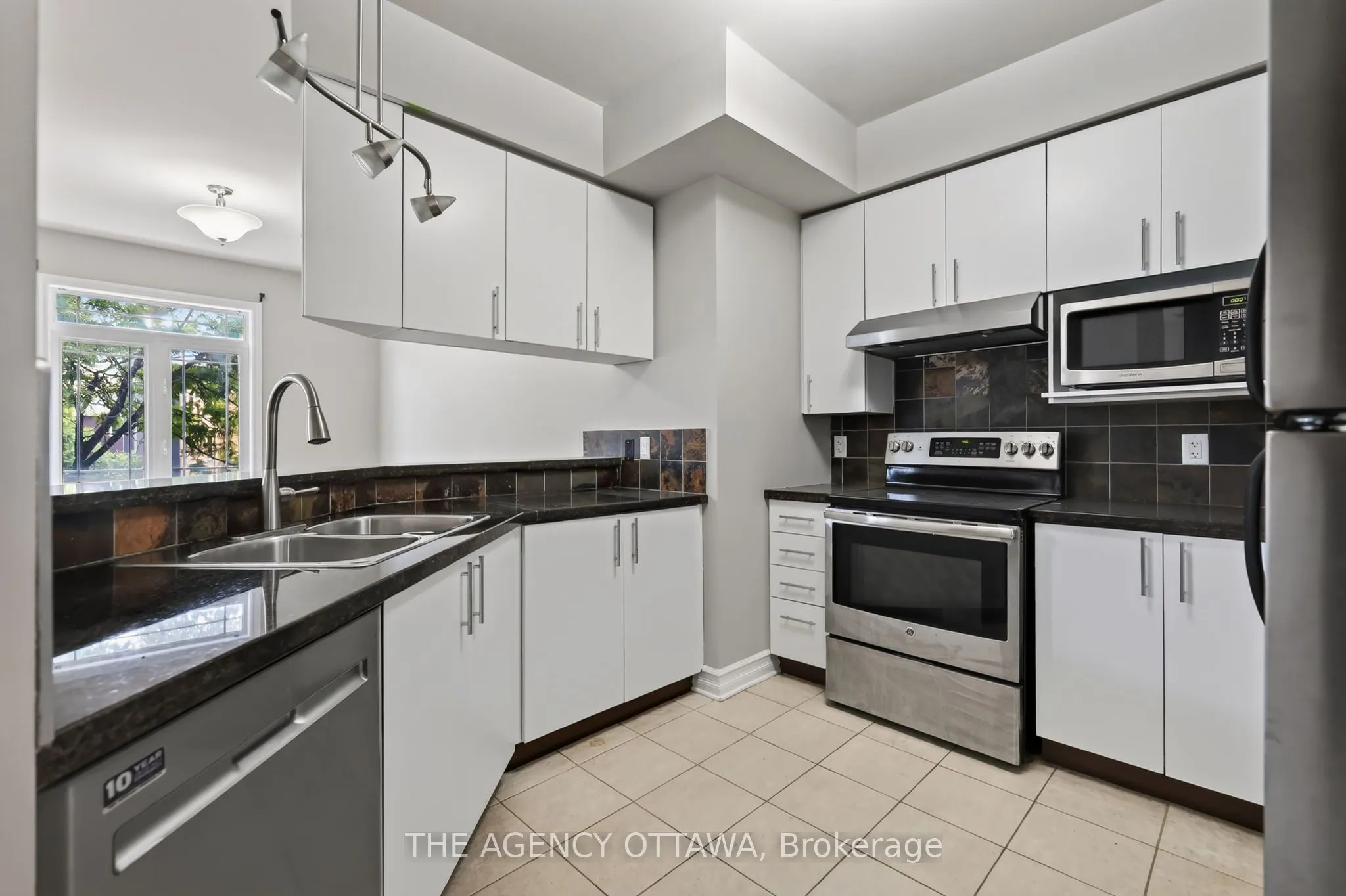 711 Churchill Avenue N #203