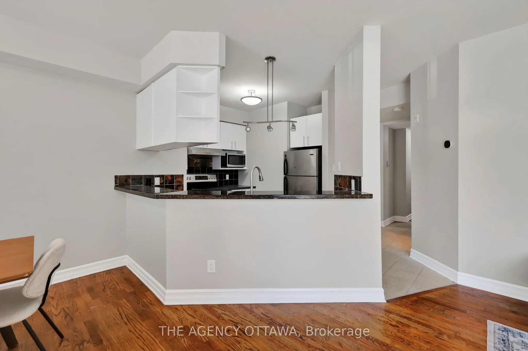711 Churchill Avenue N #203