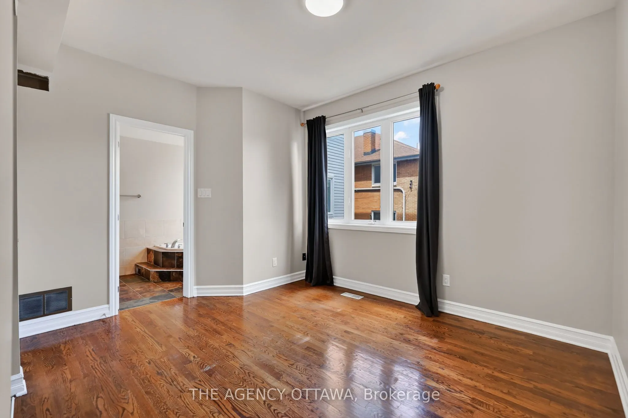 711 Churchill Avenue N #203