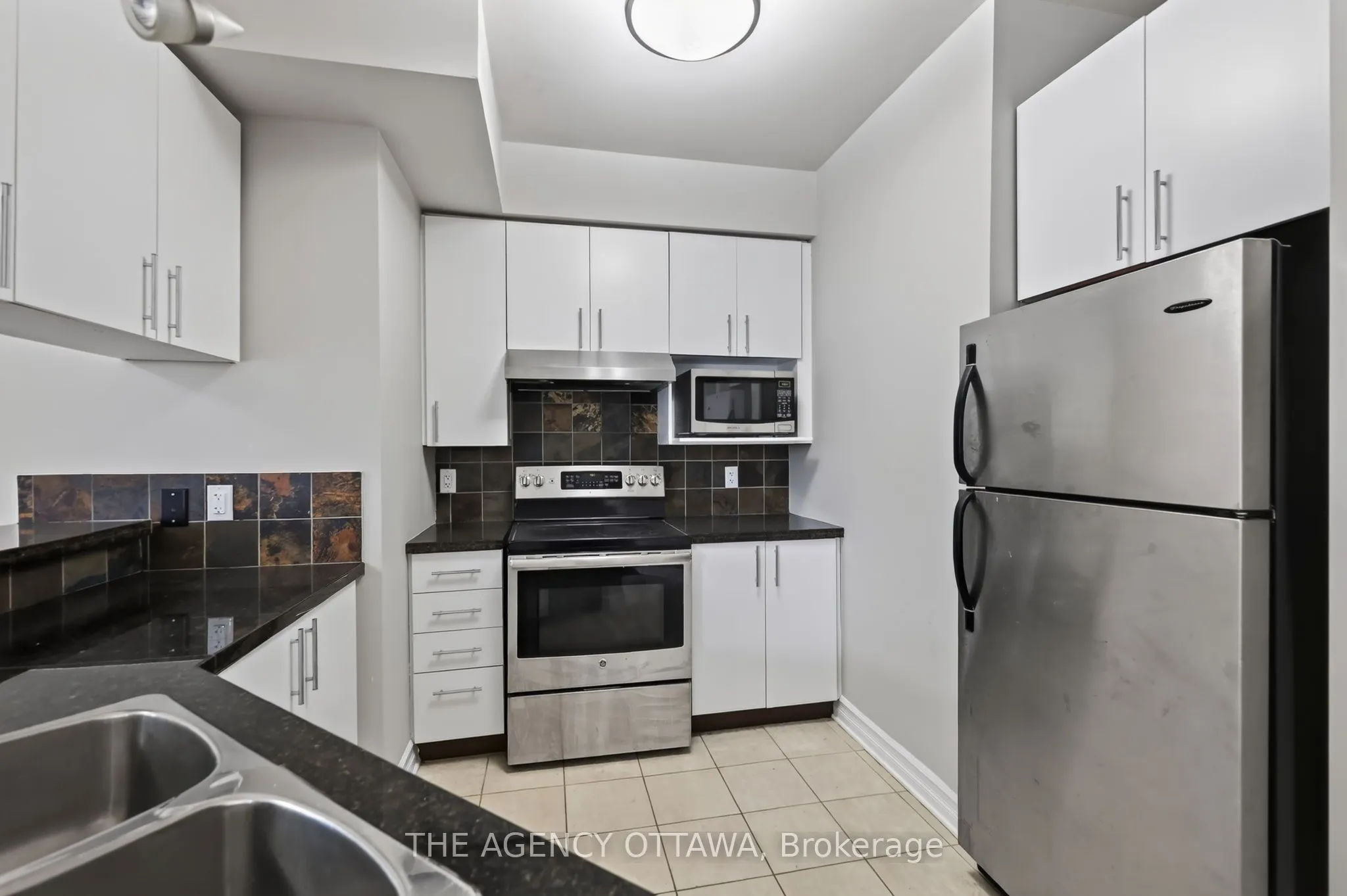 711 Churchill Avenue N #203