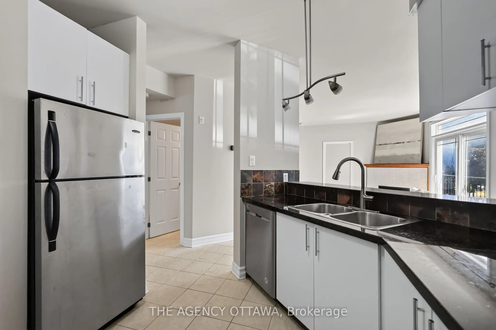 711 Churchill Avenue N #203