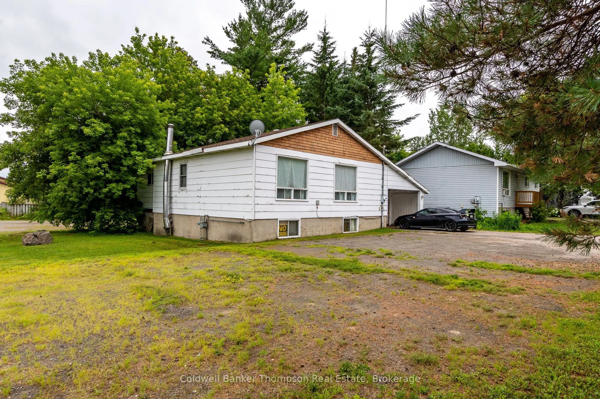 81 Centre St N & 85 West Road