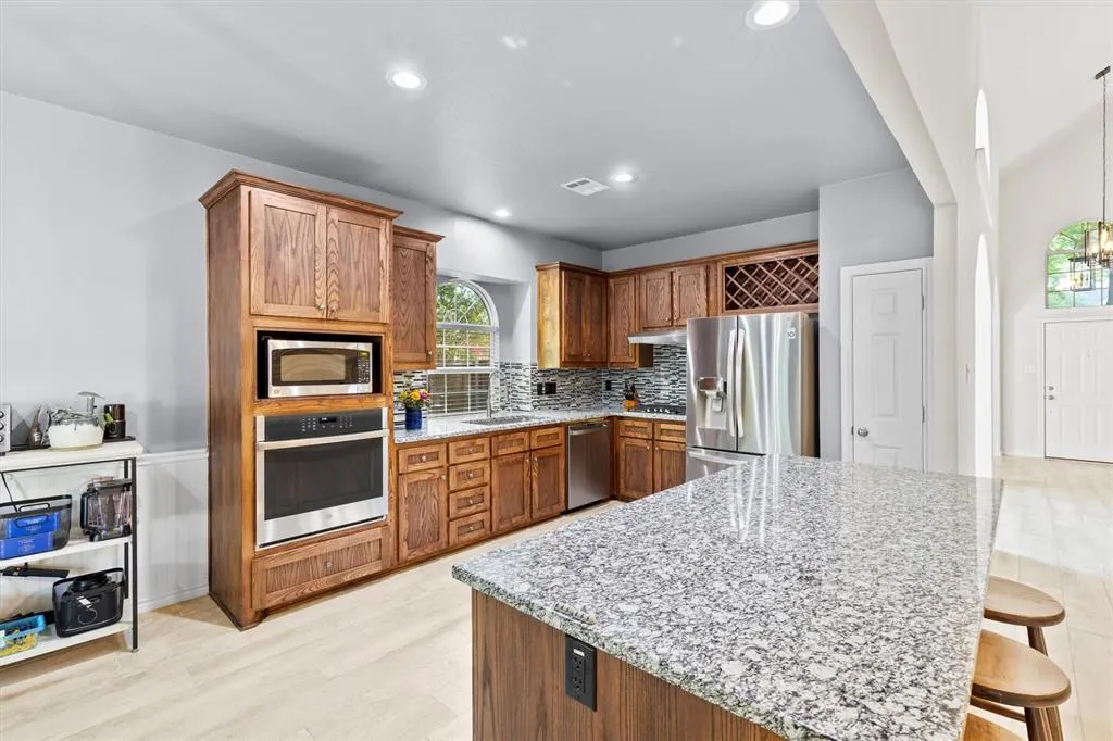 704 Wooded Creek Lane