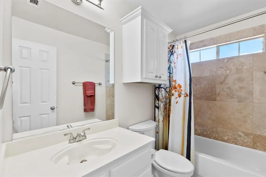 704 Wooded Creek Lane