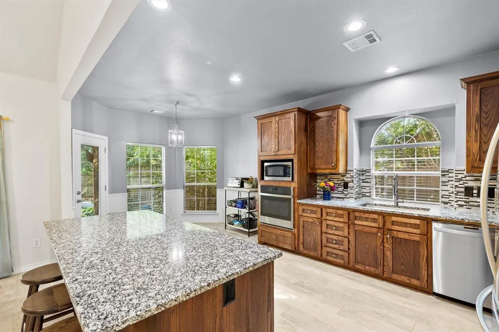 704 Wooded Creek Lane