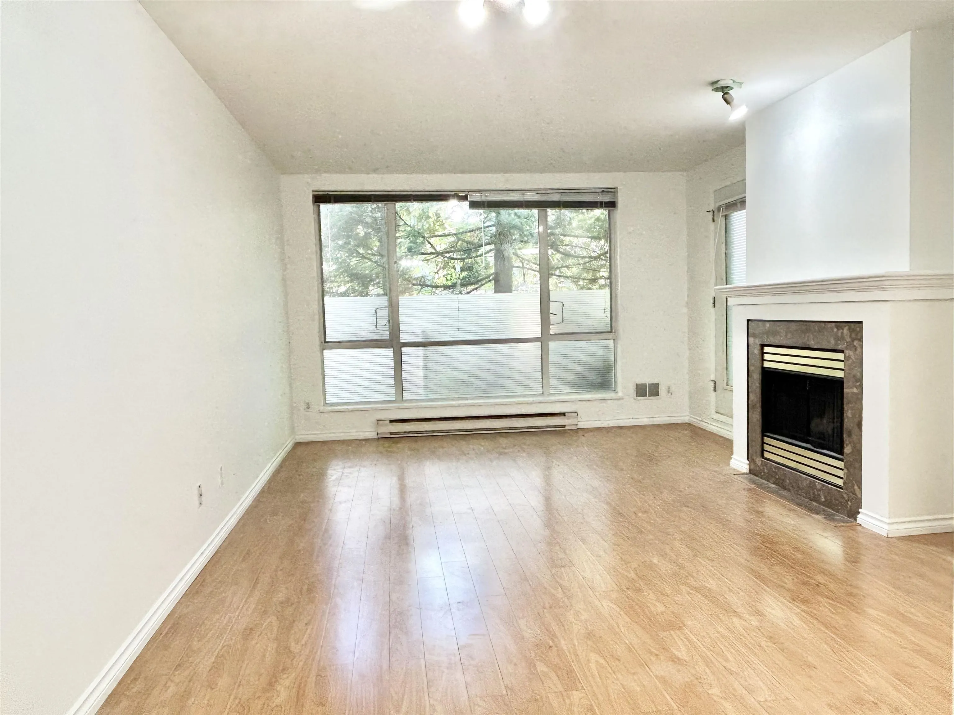 205 6742 Station Hill Court