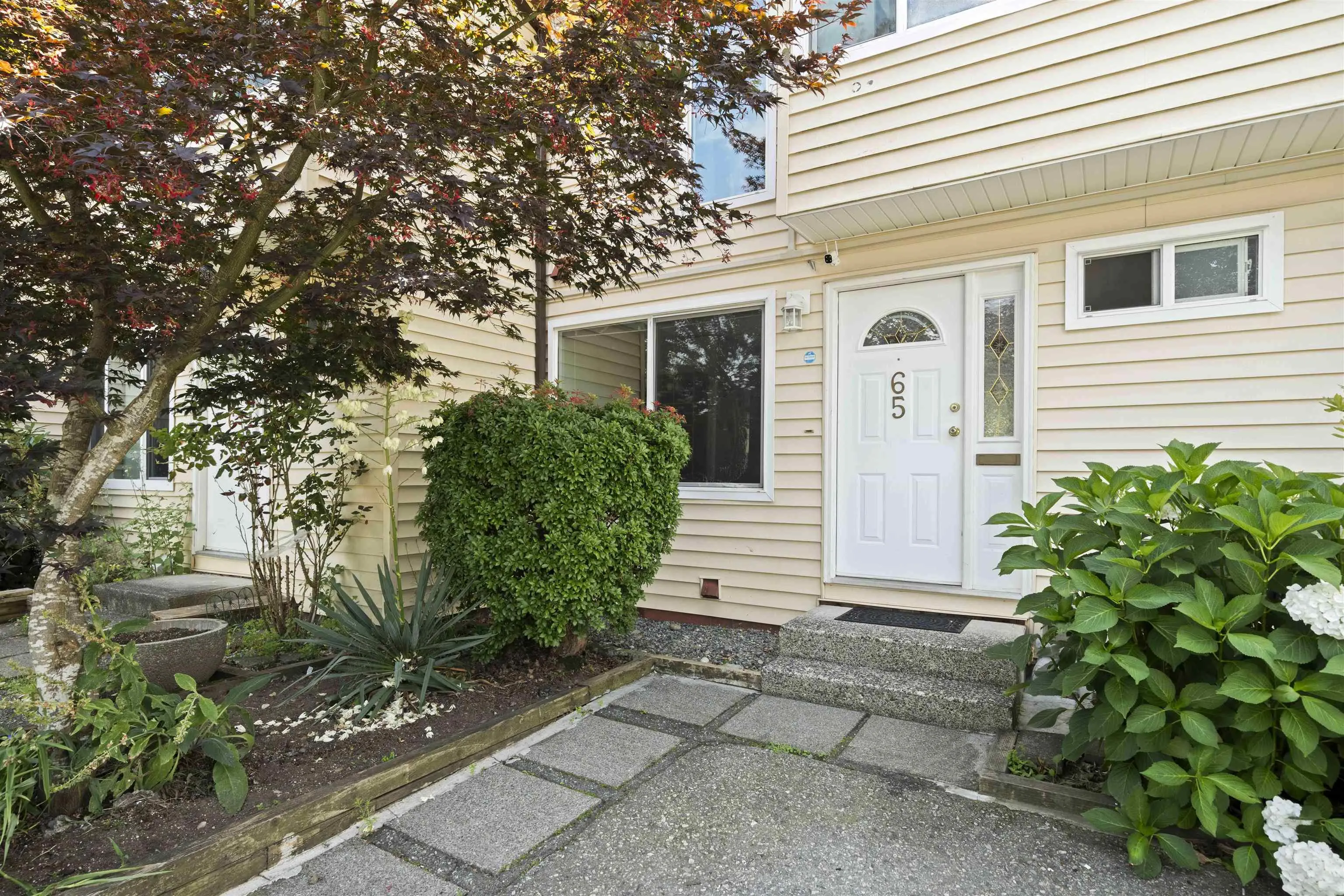 65 9366 128 Street