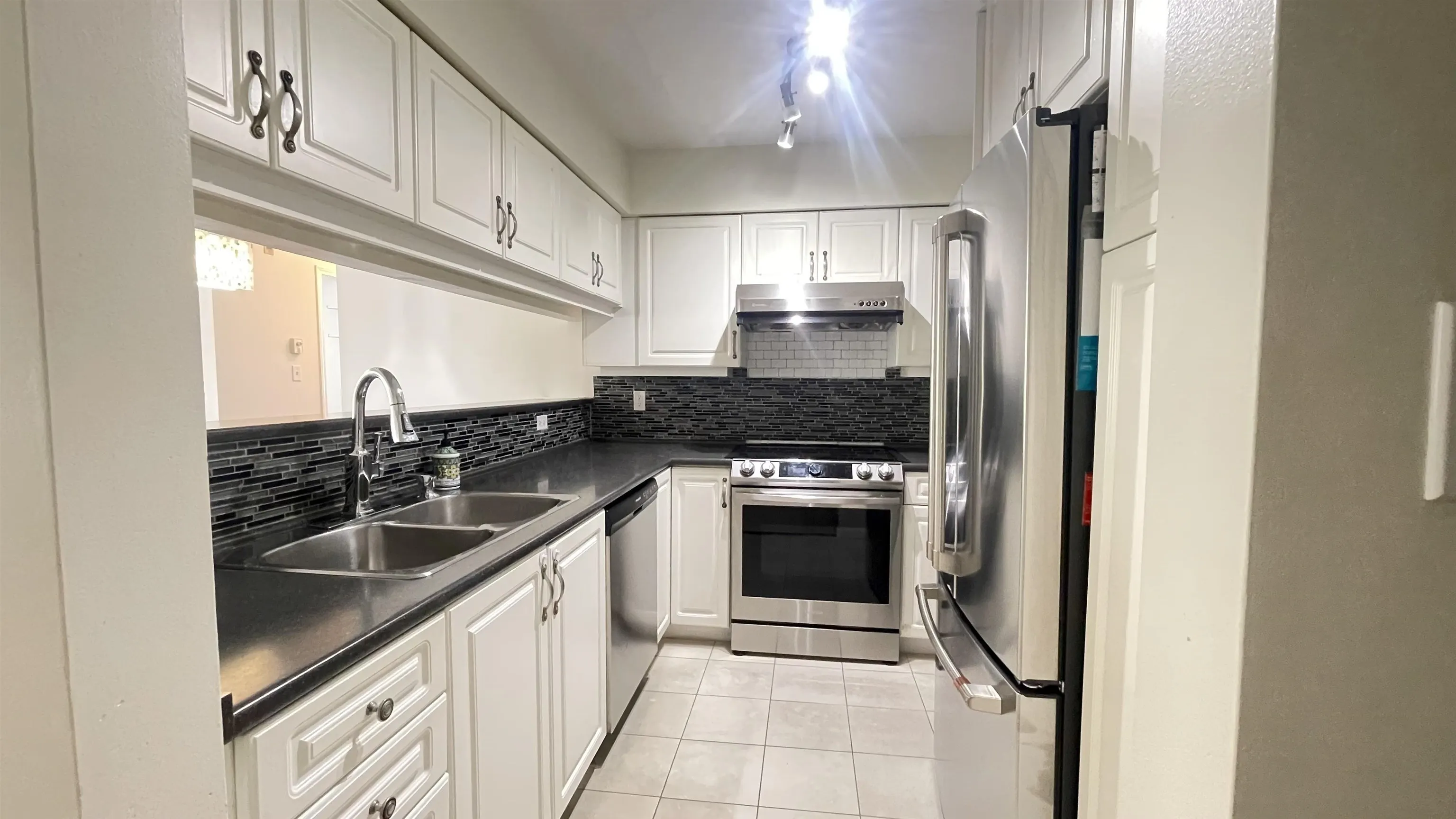 302 8728 SW Marine Drive