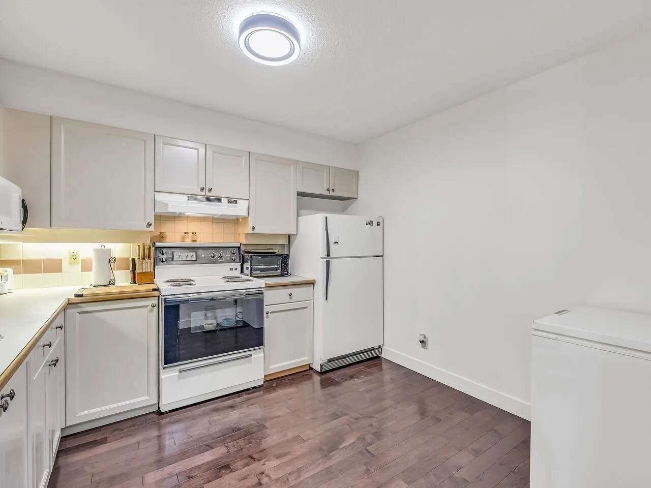 204 6735 Station Hill Court