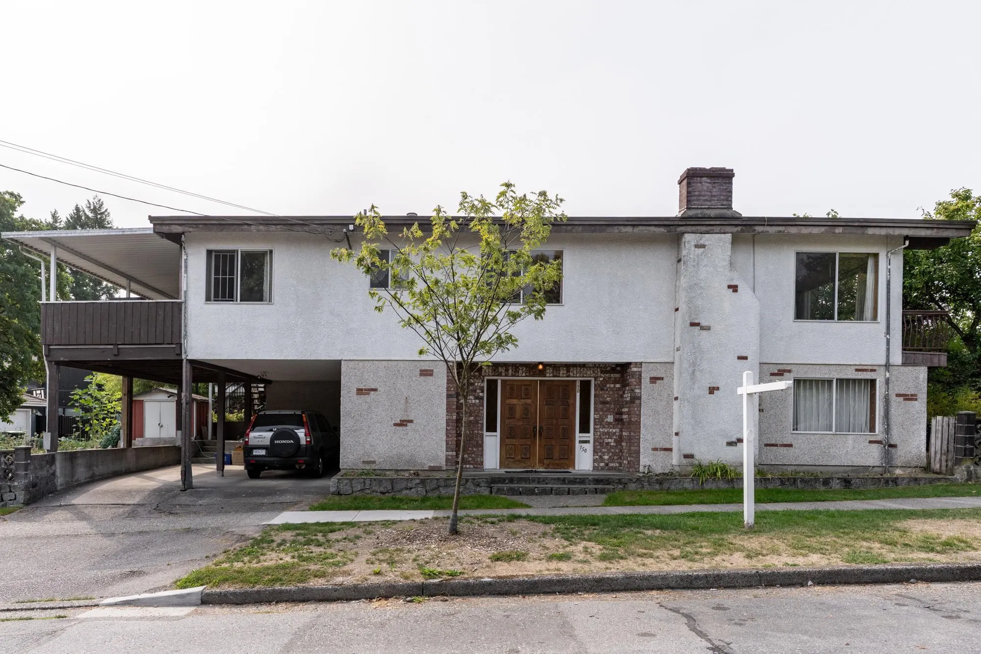 150 E 28 Avenue
