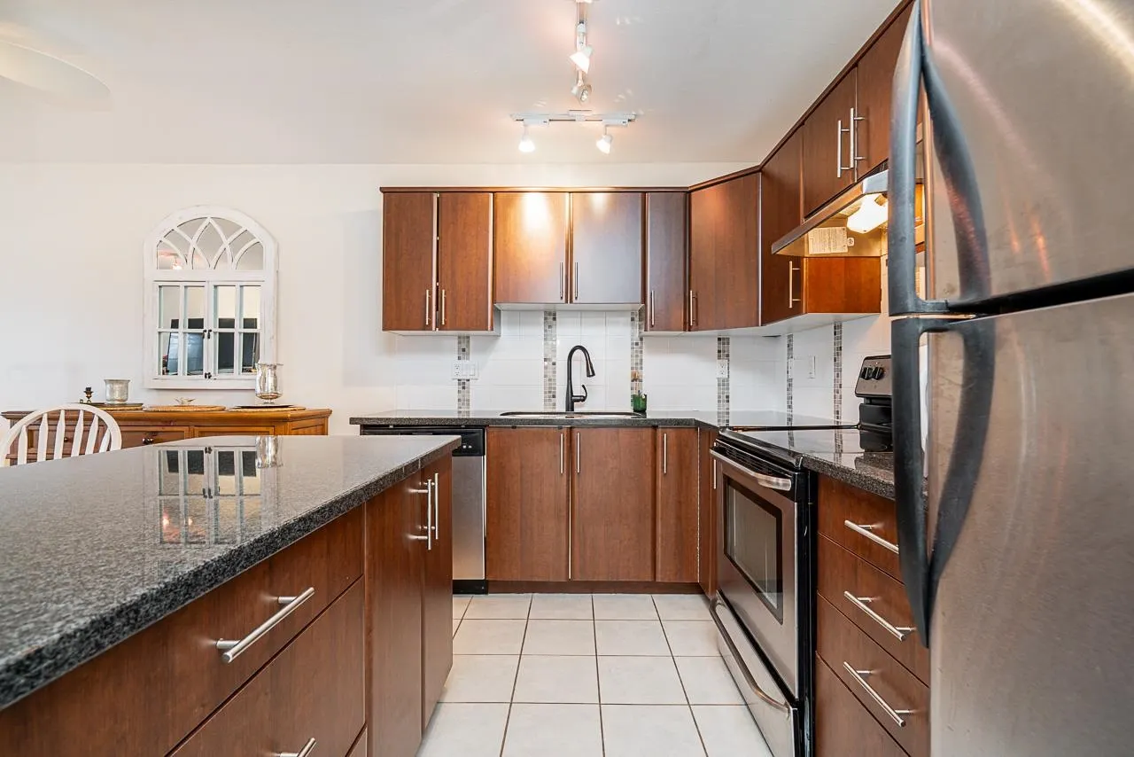 309 19388 65 Avenue