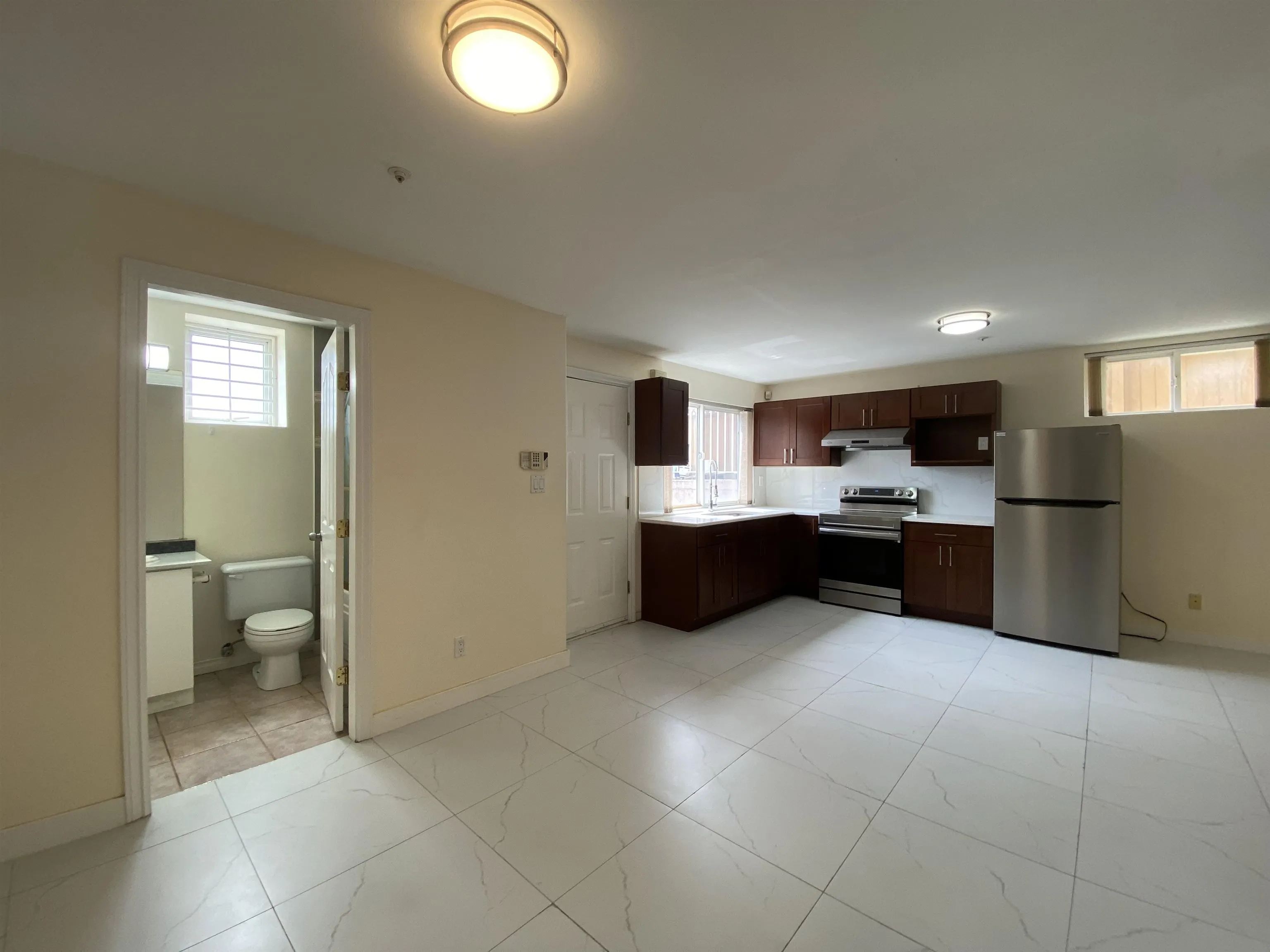 Half Basement 1688 E 59th Avenue