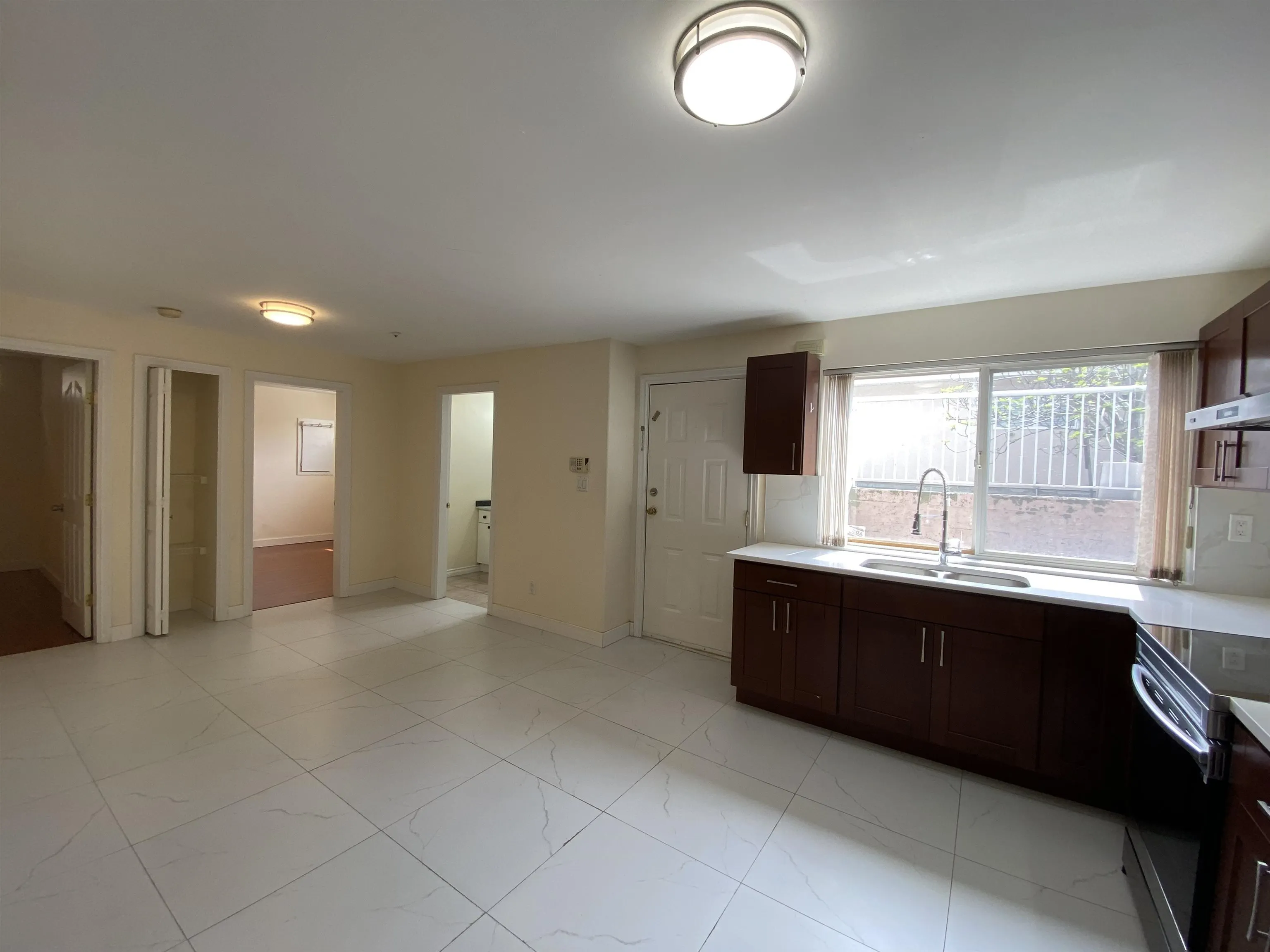 Half Basement 1688 E 59th Avenue