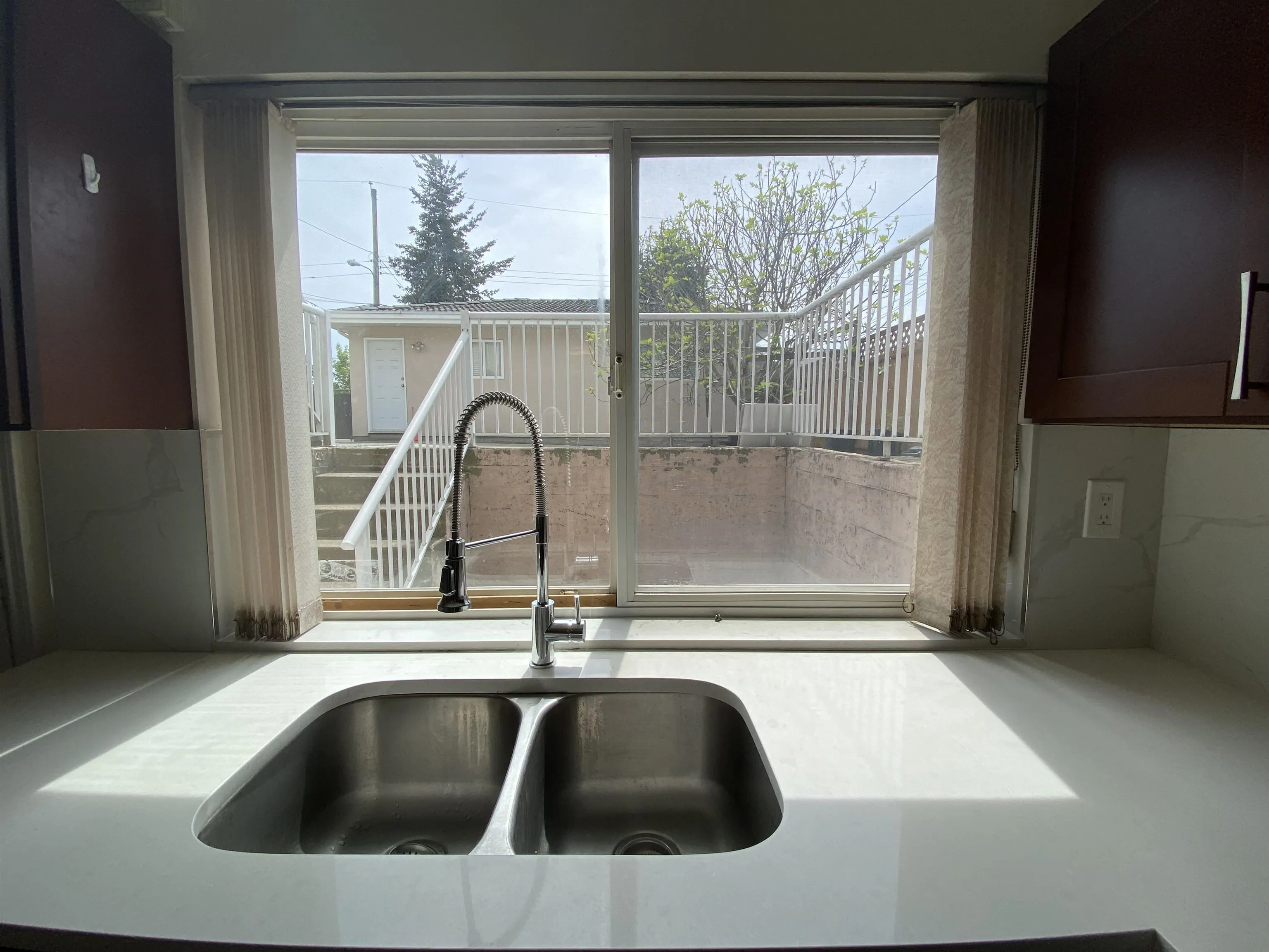 Half Basement 1688 E 59th Avenue