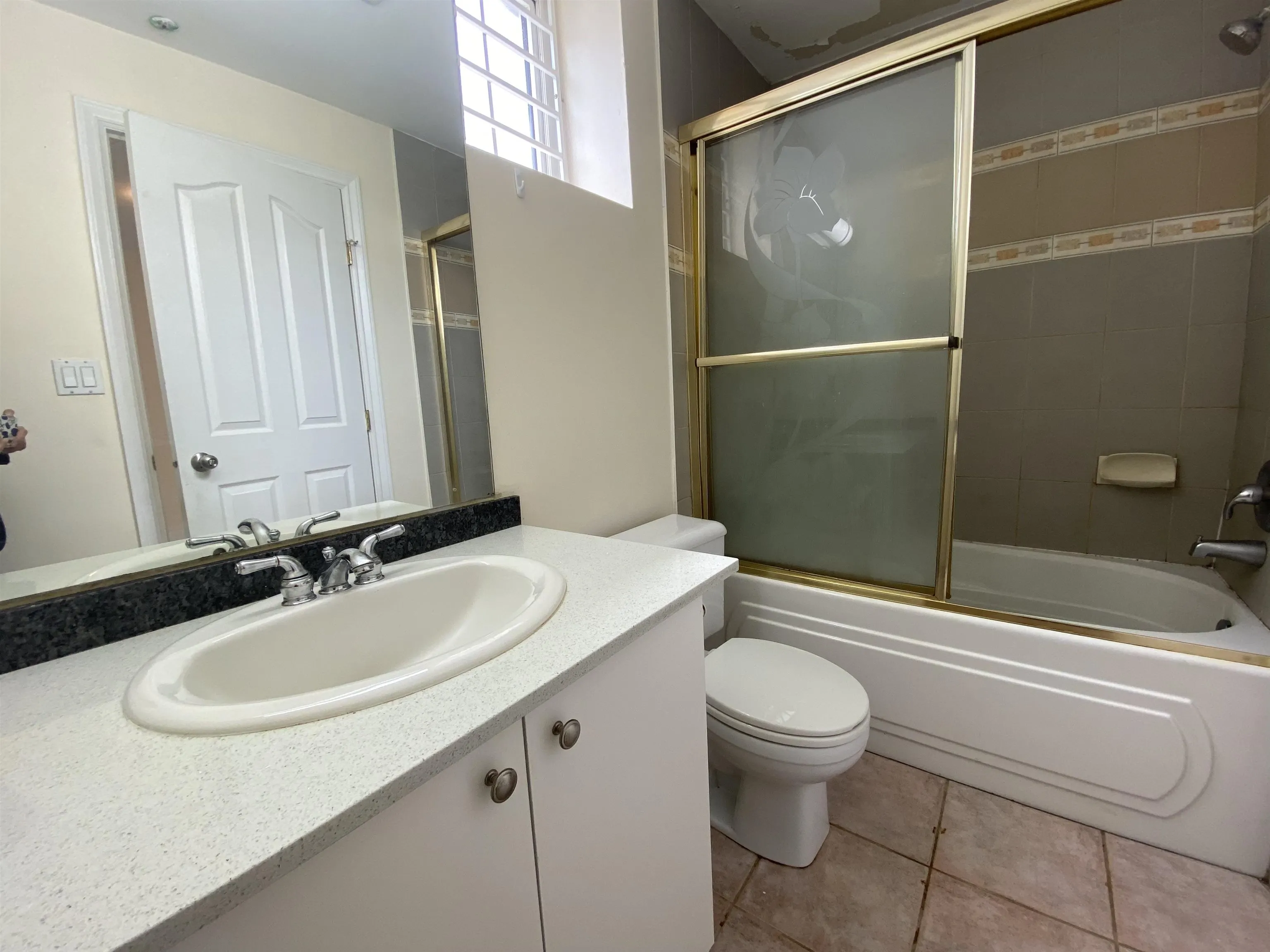 Half Basement 1688 E 59th Avenue