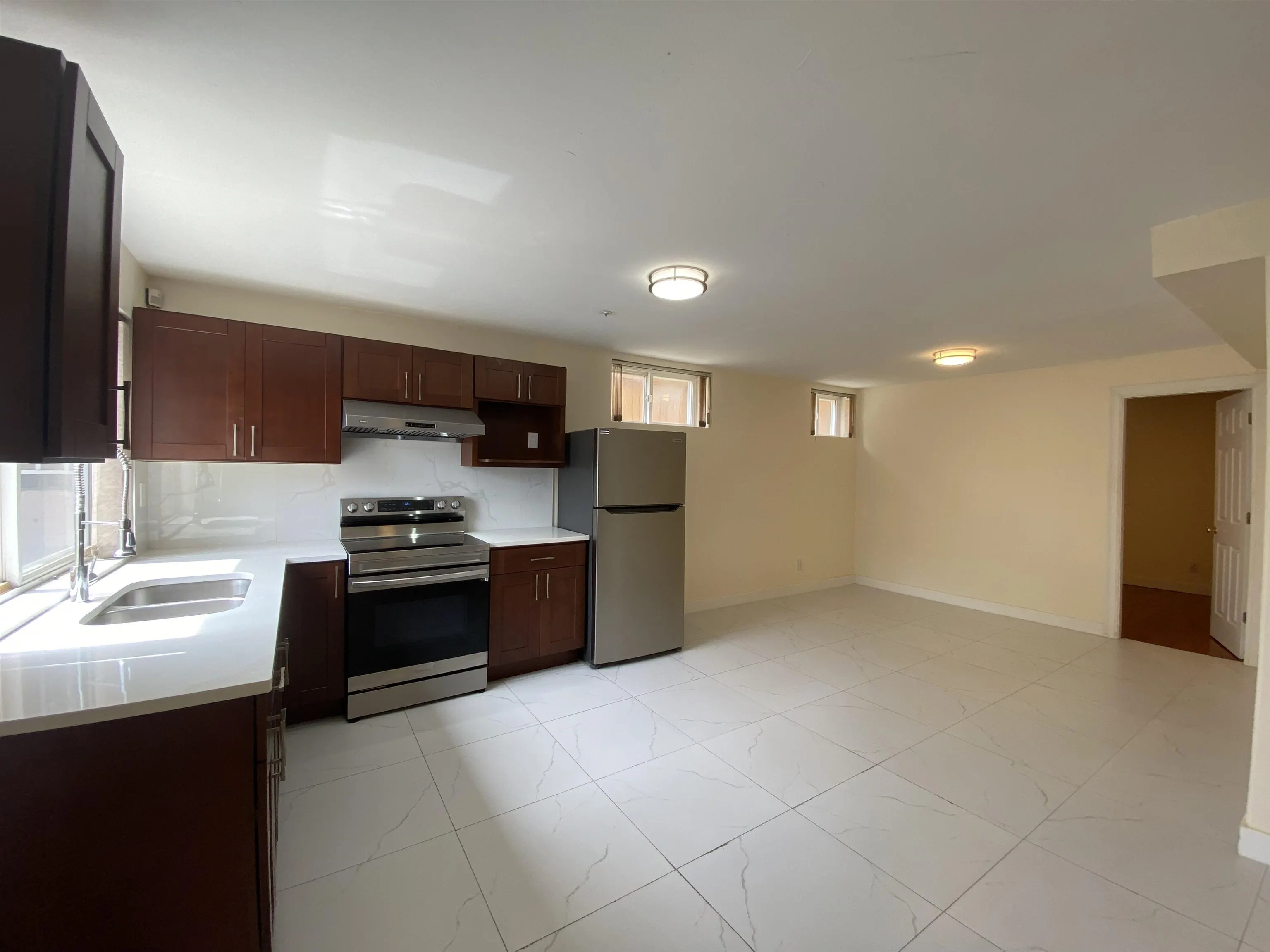 Half Basement 1688 E 59th Avenue