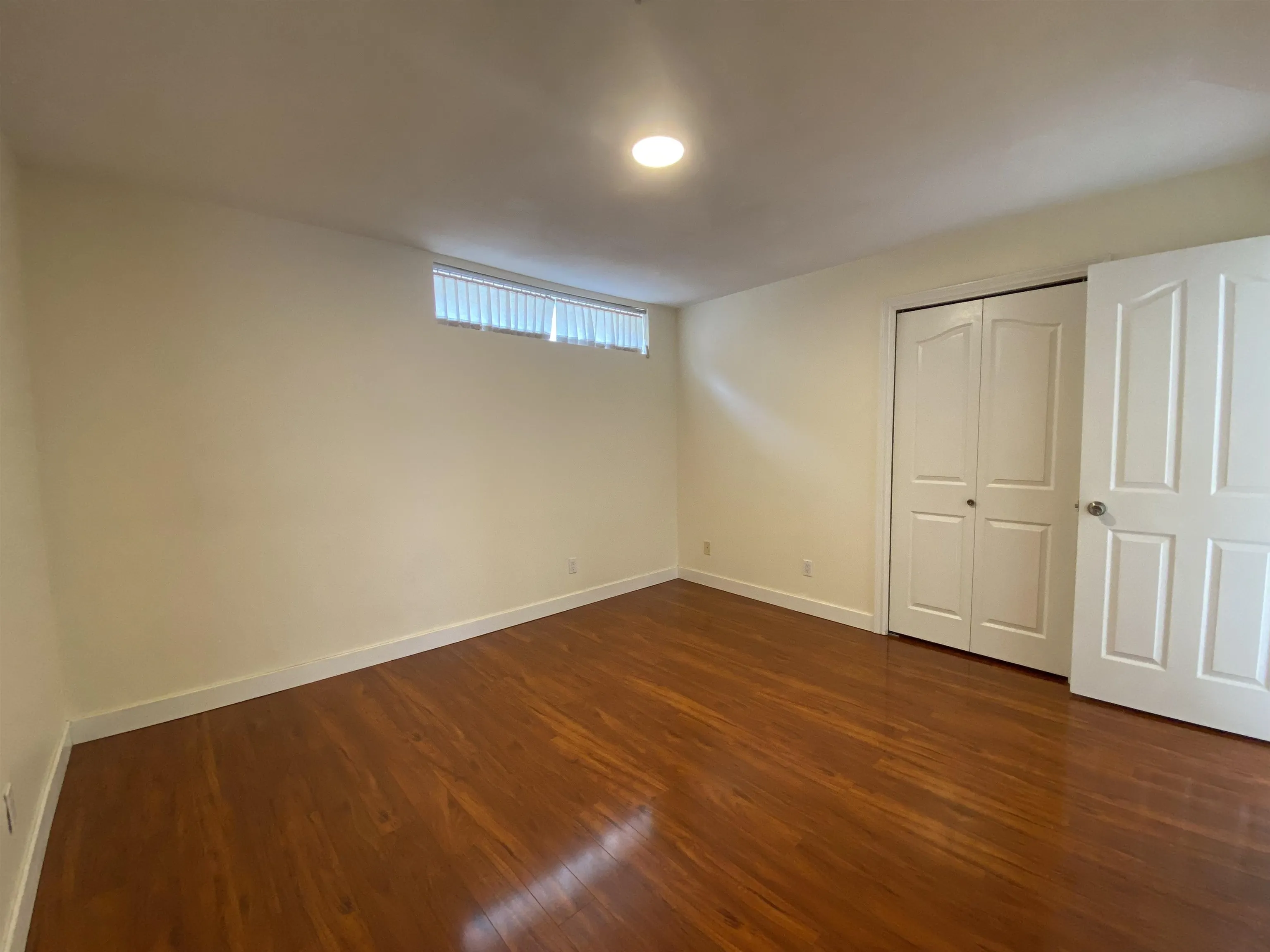 Half Basement 1688 E 59th Avenue