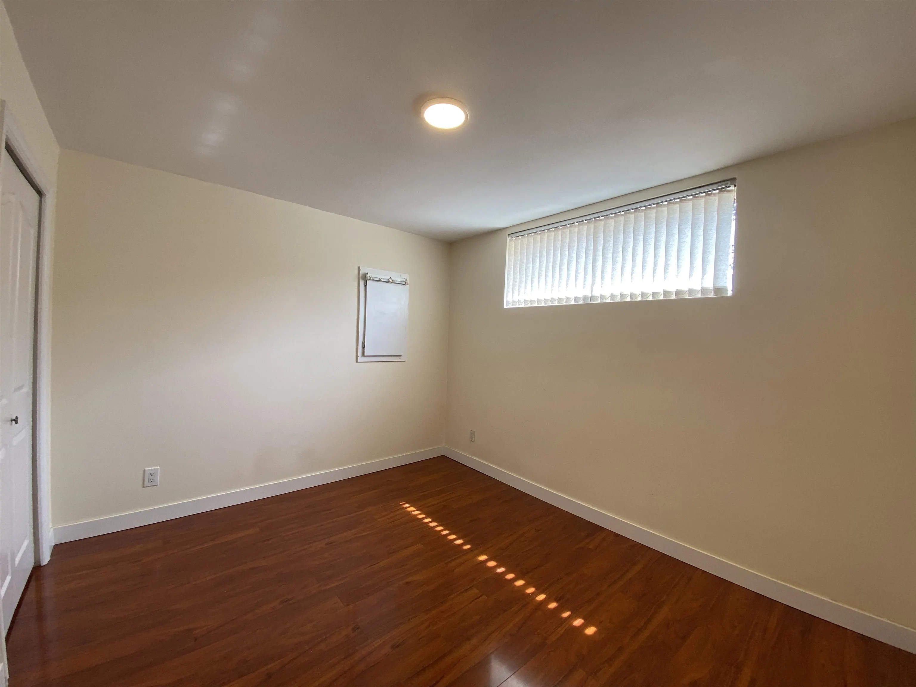 Half Basement 1688 E 59th Avenue