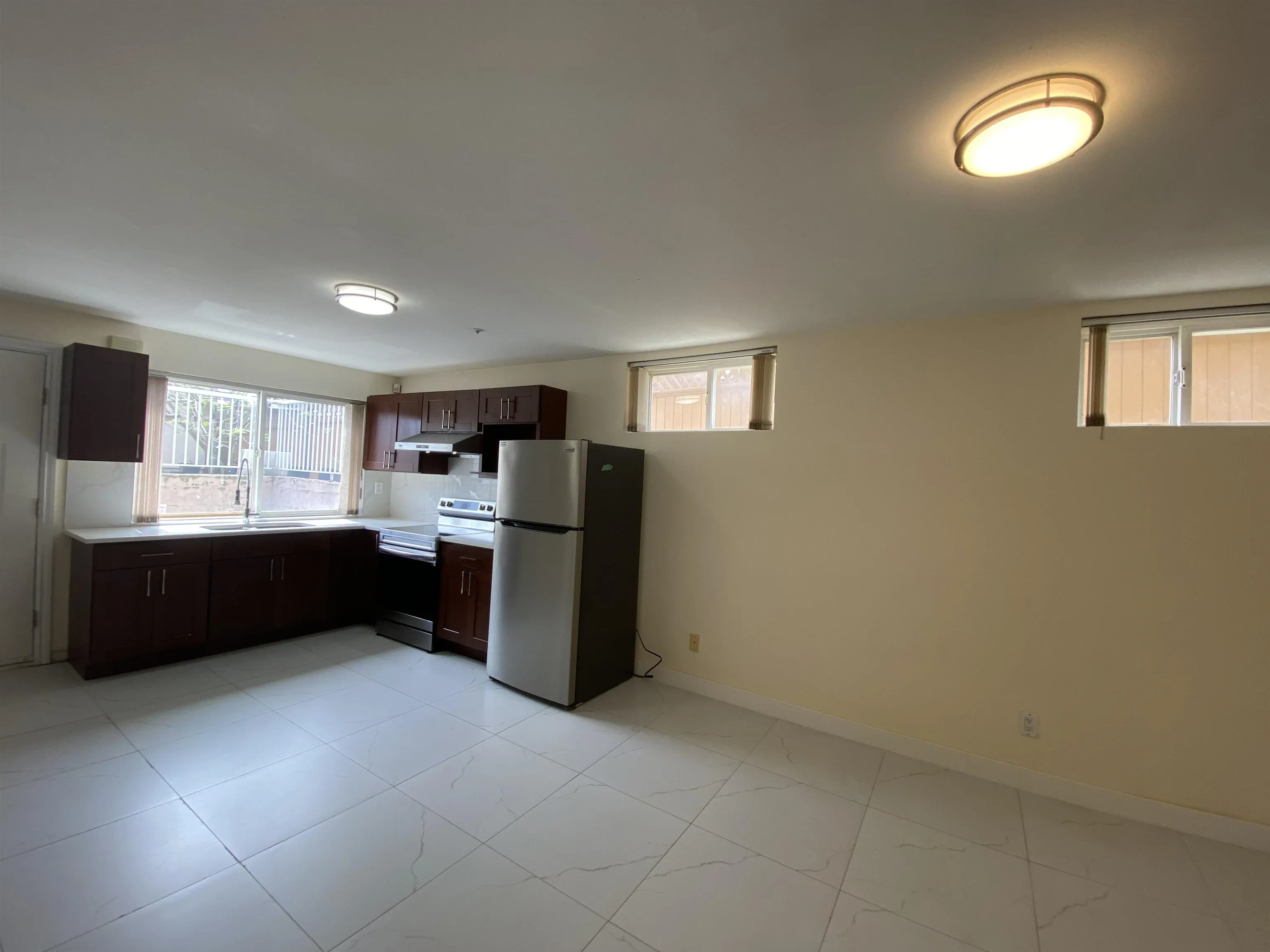 Half Basement 1688 E 59th Avenue