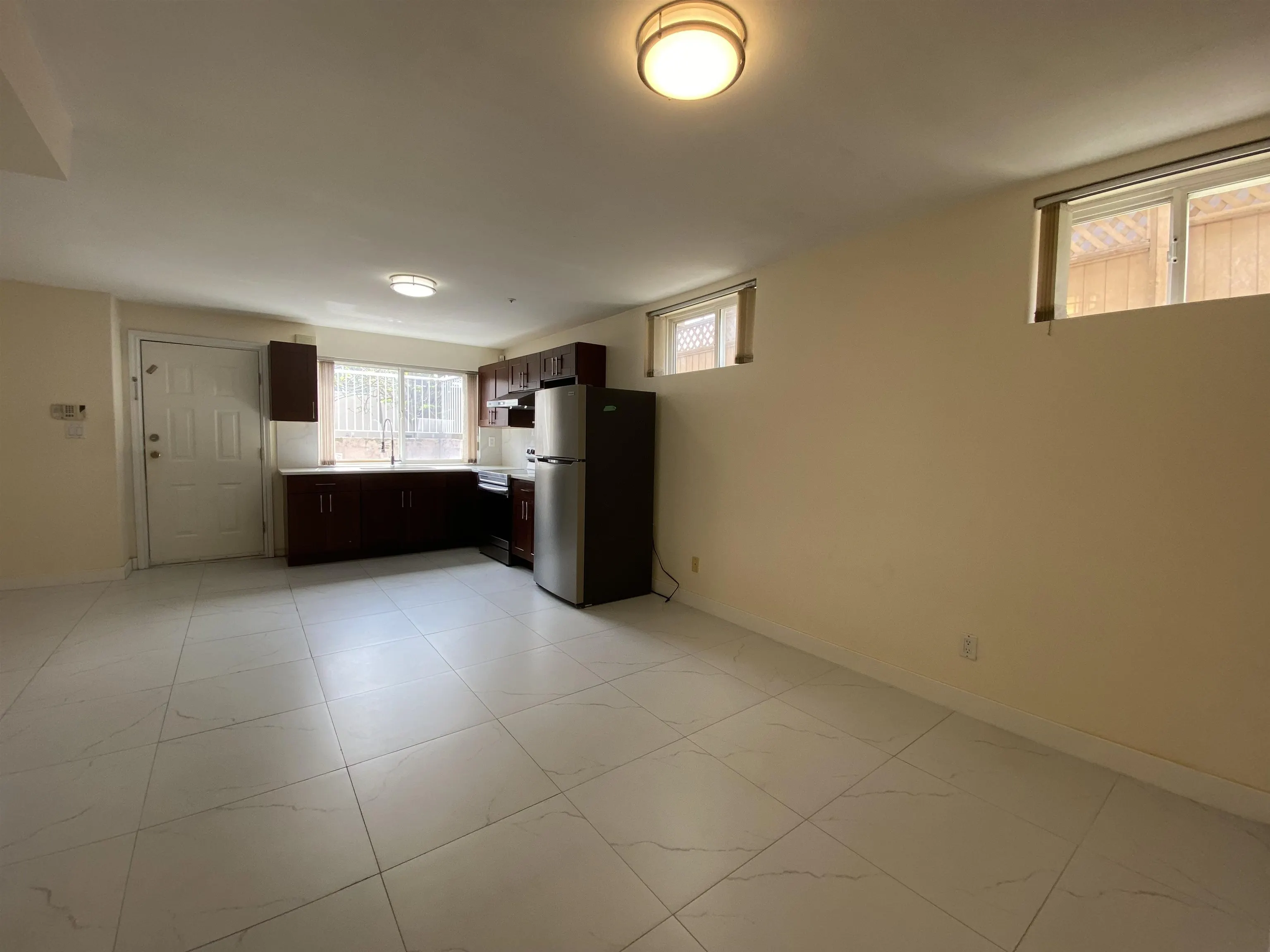 Half Basement 1688 E 59th Avenue