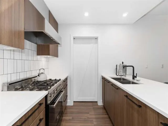 105 6933 Cambie Street