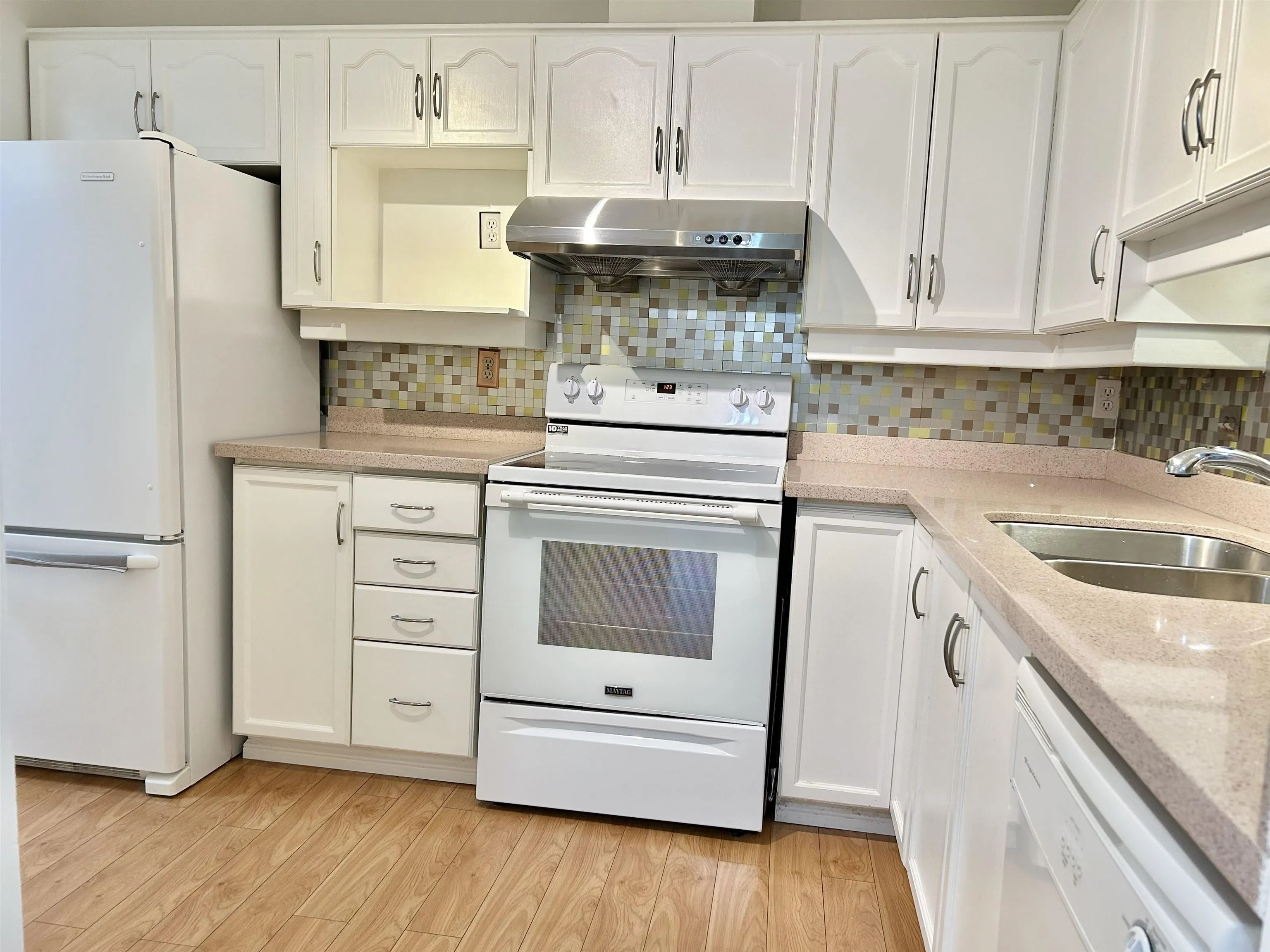 205 6742 Station Hill Court