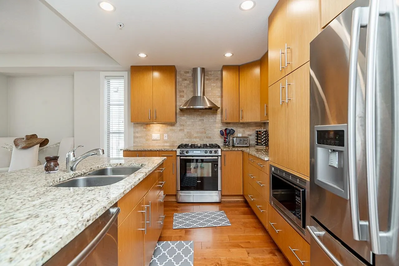 16469 64 Avenue #204