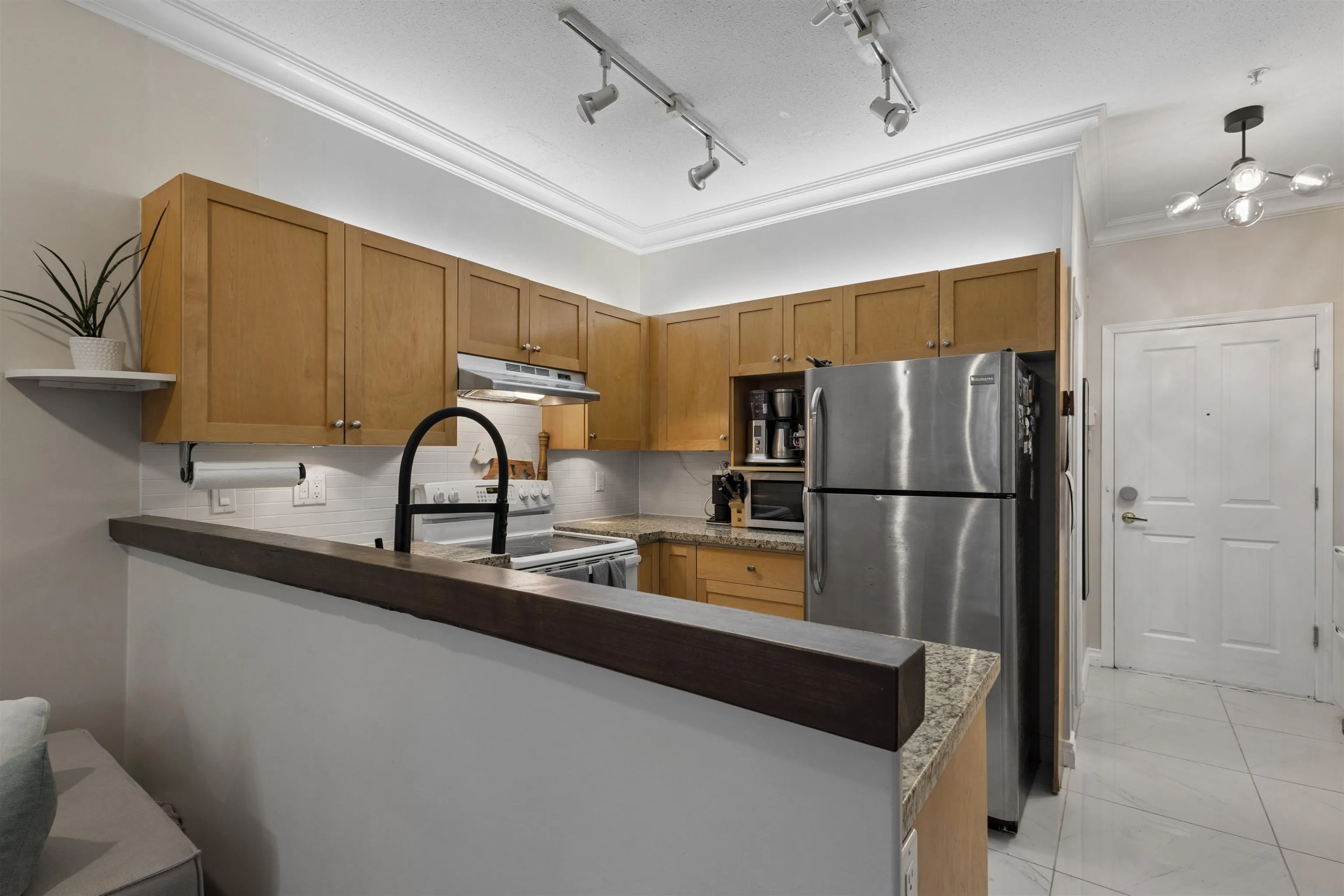 1675 W 10th Avenue #101