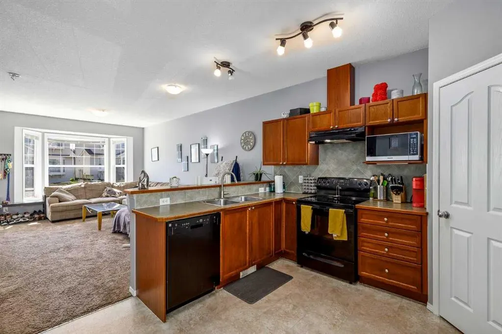 703 Luxstone Square SW, #1303