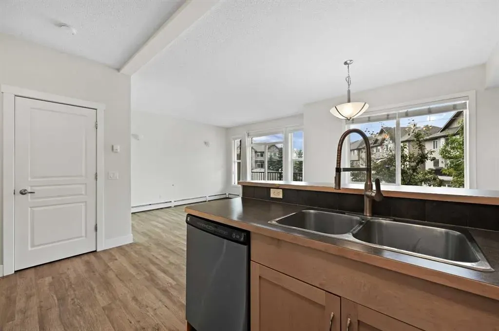 211 Aspen Stone Boulevard SW, #1212