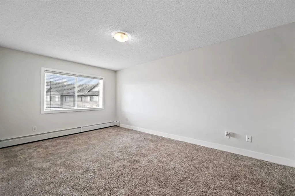 211 Aspen Stone Boulevard SW, #1212