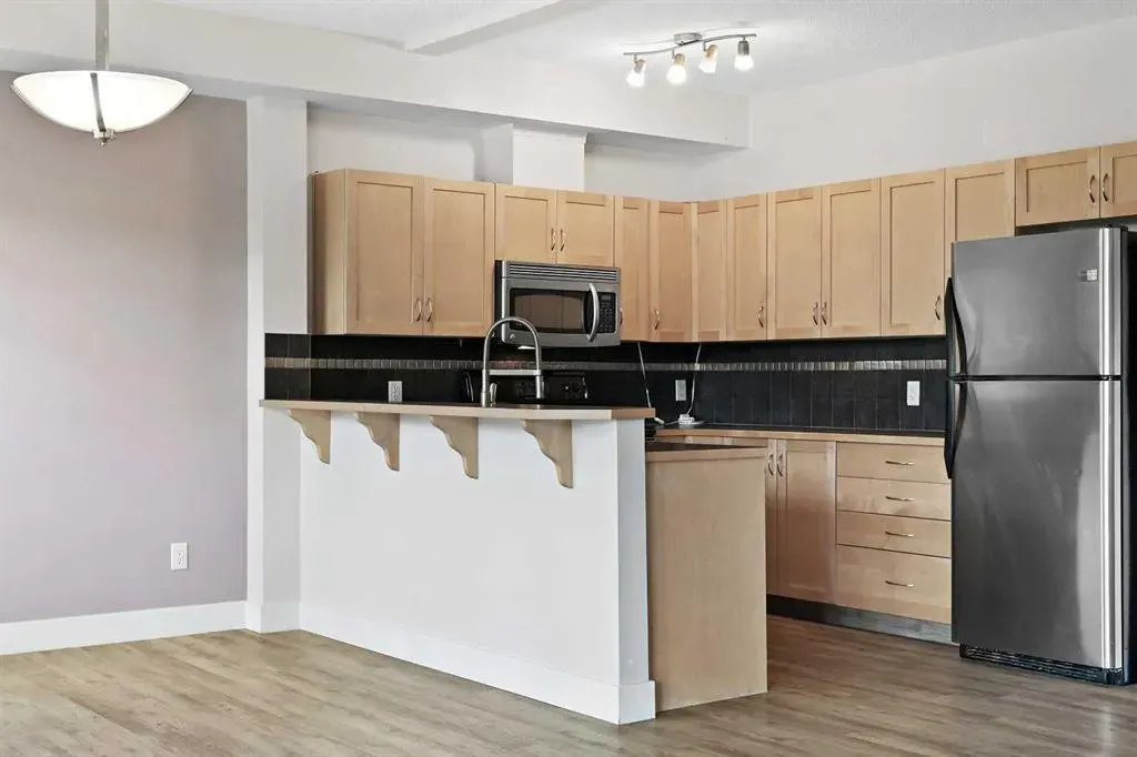 211 Aspen Stone Boulevard SW, #1212
