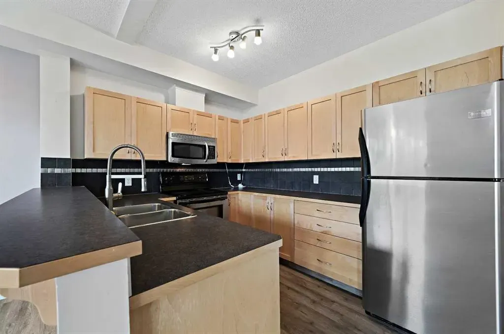 211 Aspen Stone Boulevard SW, #1212