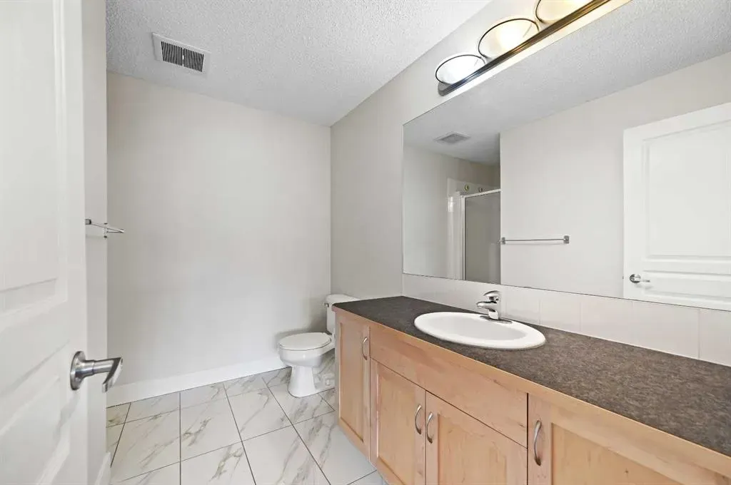 211 Aspen Stone Boulevard SW, #1212