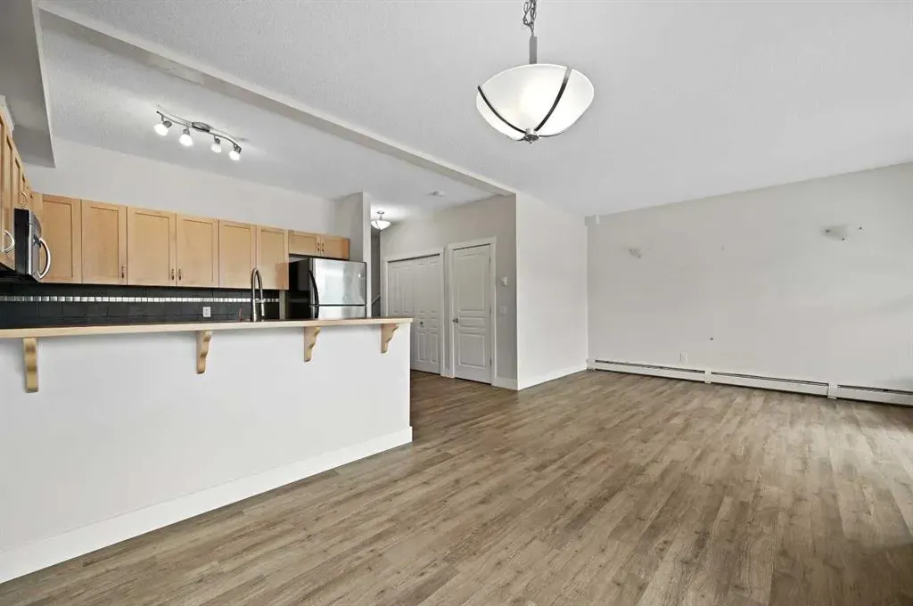 211 Aspen Stone Boulevard SW, #1212