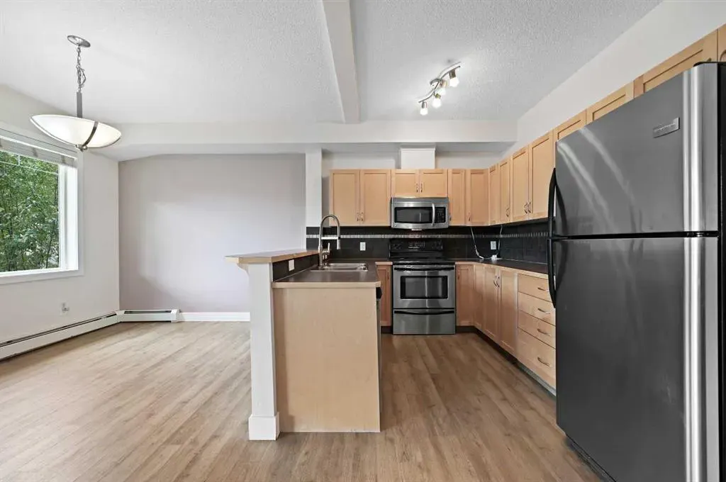 211 Aspen Stone Boulevard SW, #1212