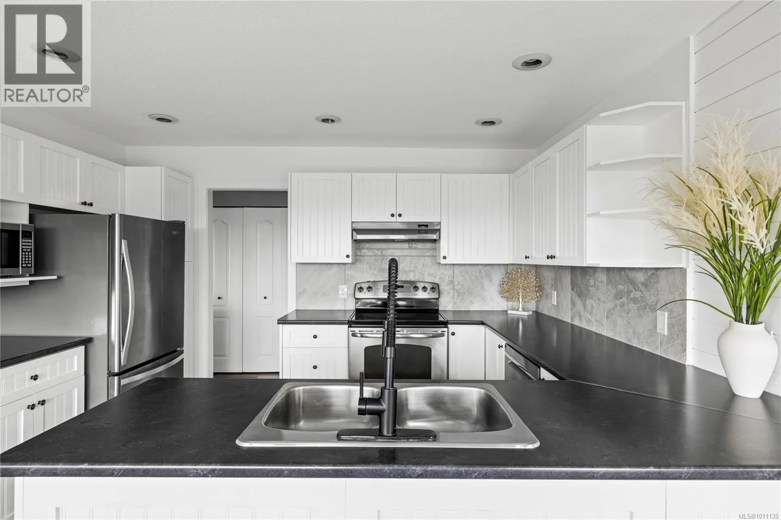 6239 Scollos Pl