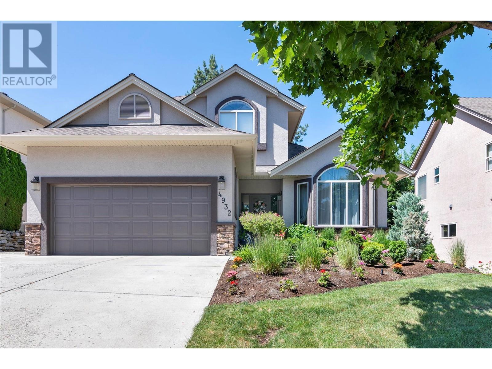 4932 Windsong Crescent,